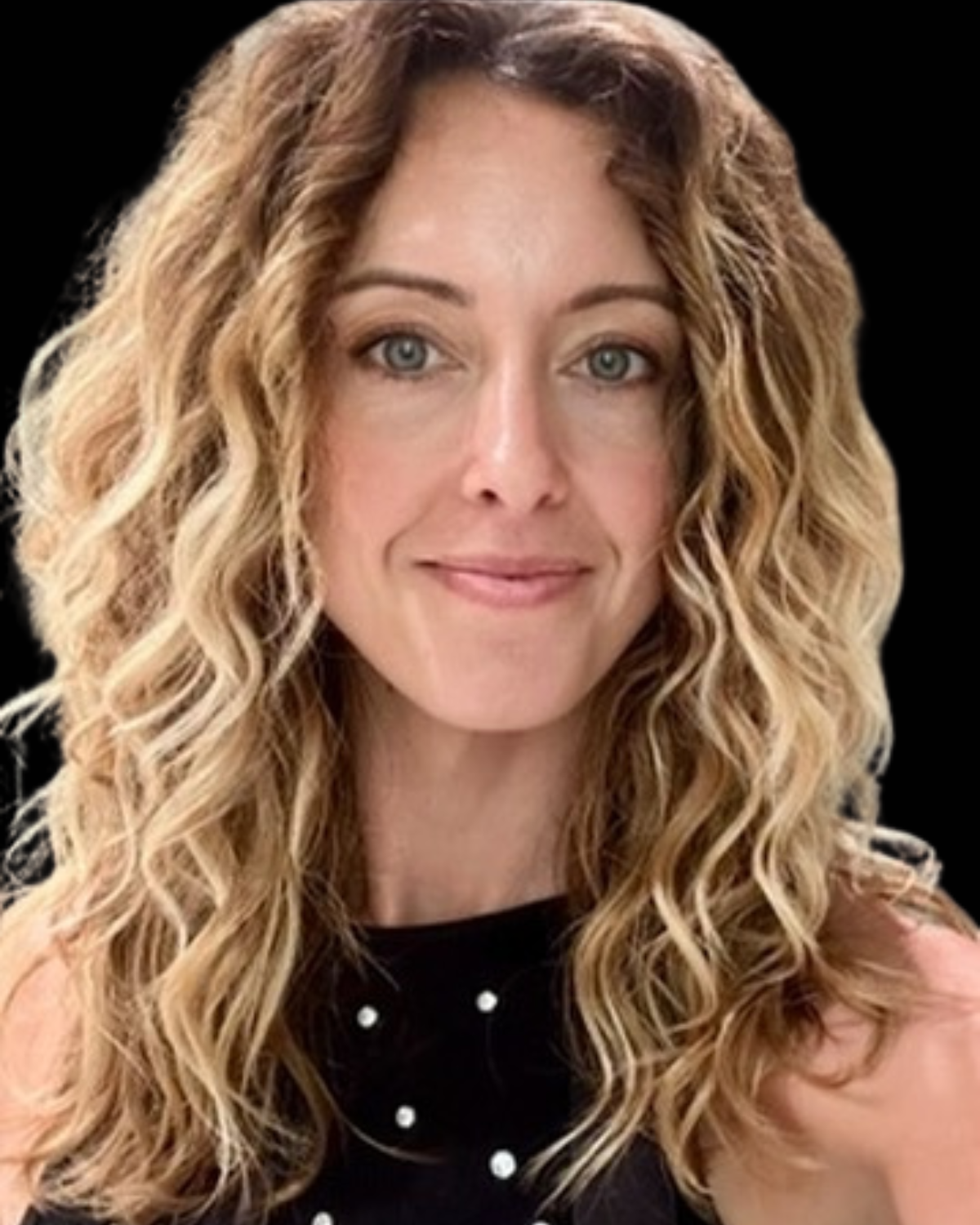 women with wavy blonde hair smiling at the camera