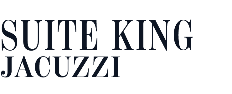 Texto que dice 'Suite King Jacuzzi' en letras negras sobre fondo oscuro.