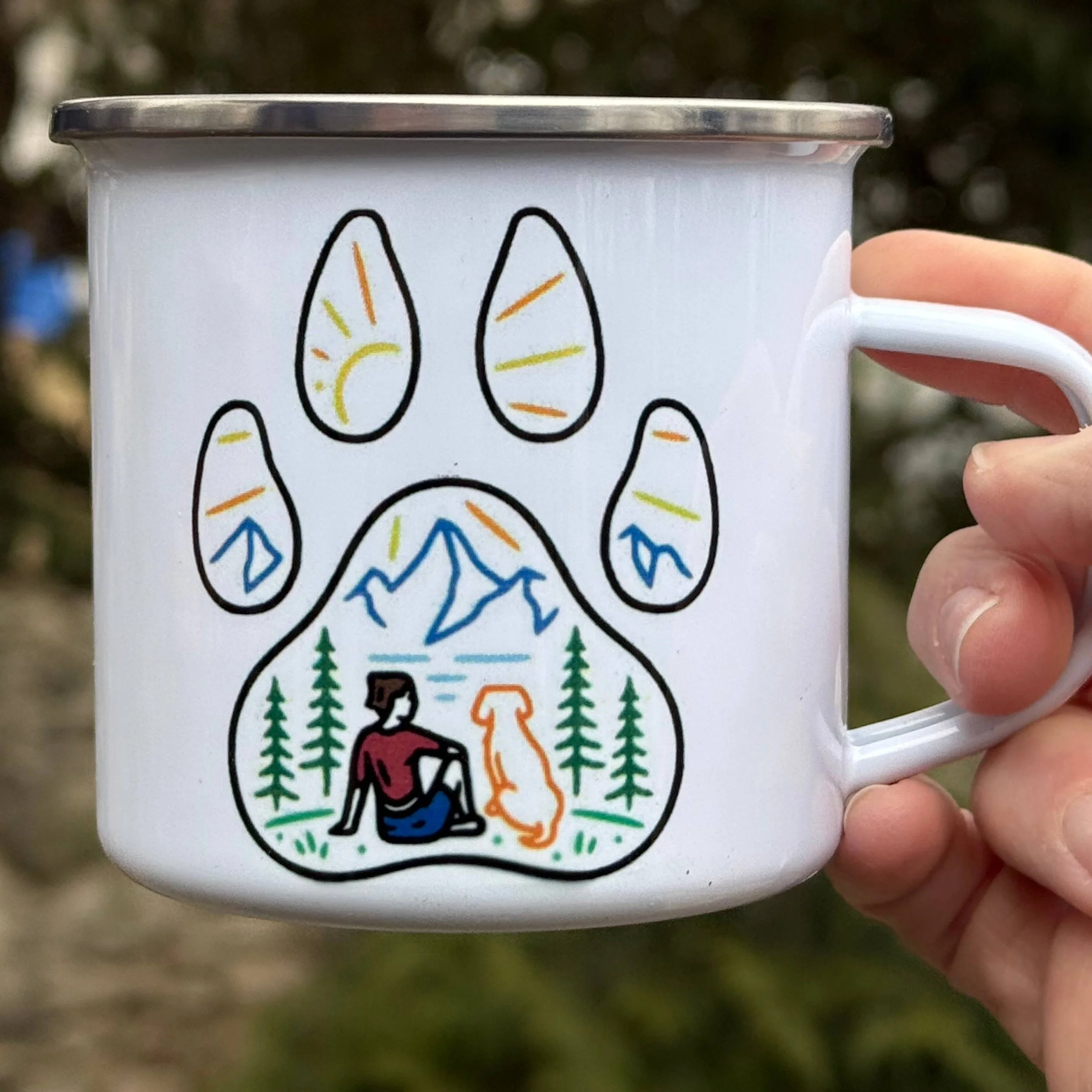 A White 4" enamel metal camping cup with an image of a girl and her dog