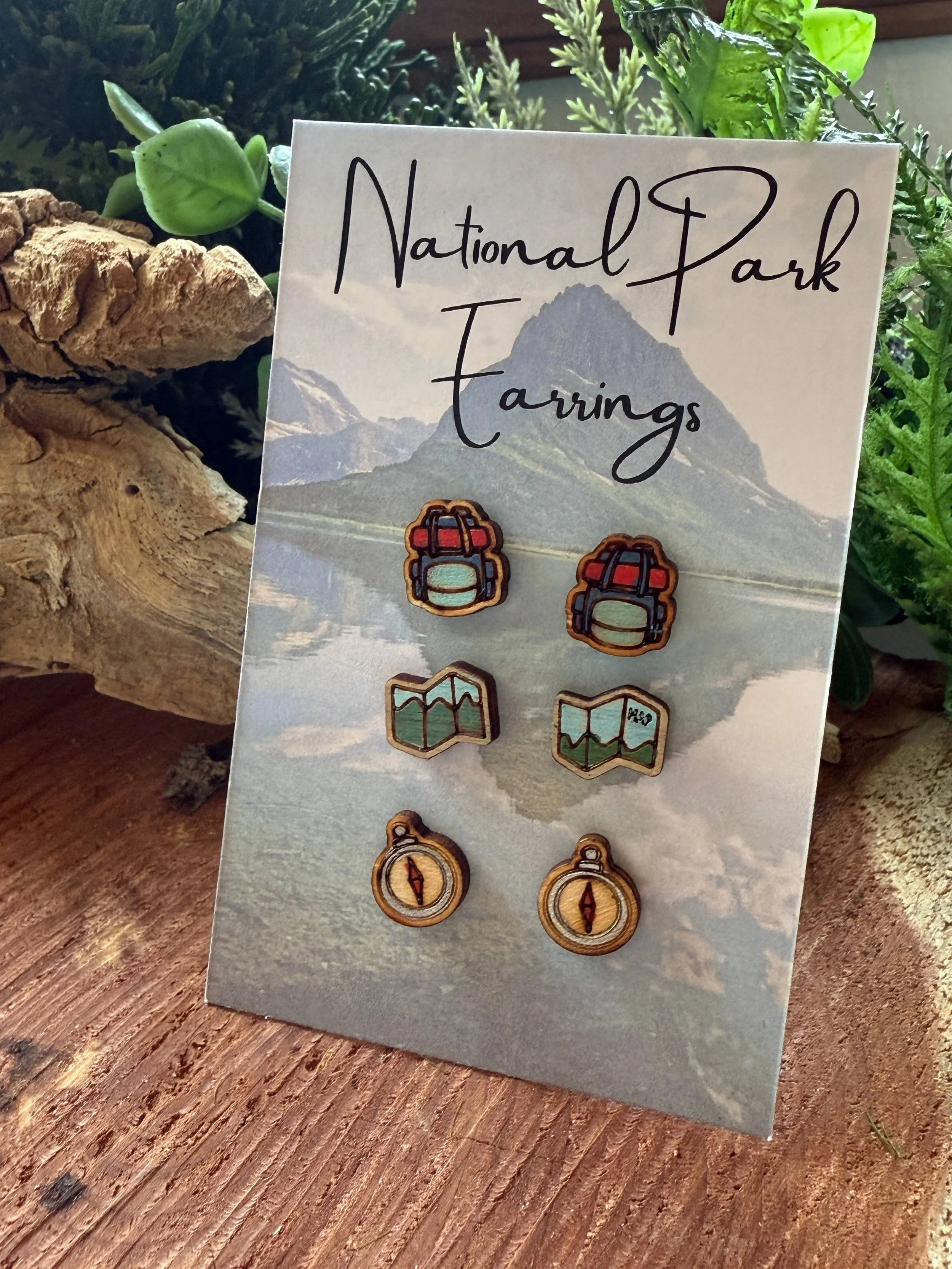 pair 2 is a map and pair 3 is a compass. All handmade earrings are hand painted as well.