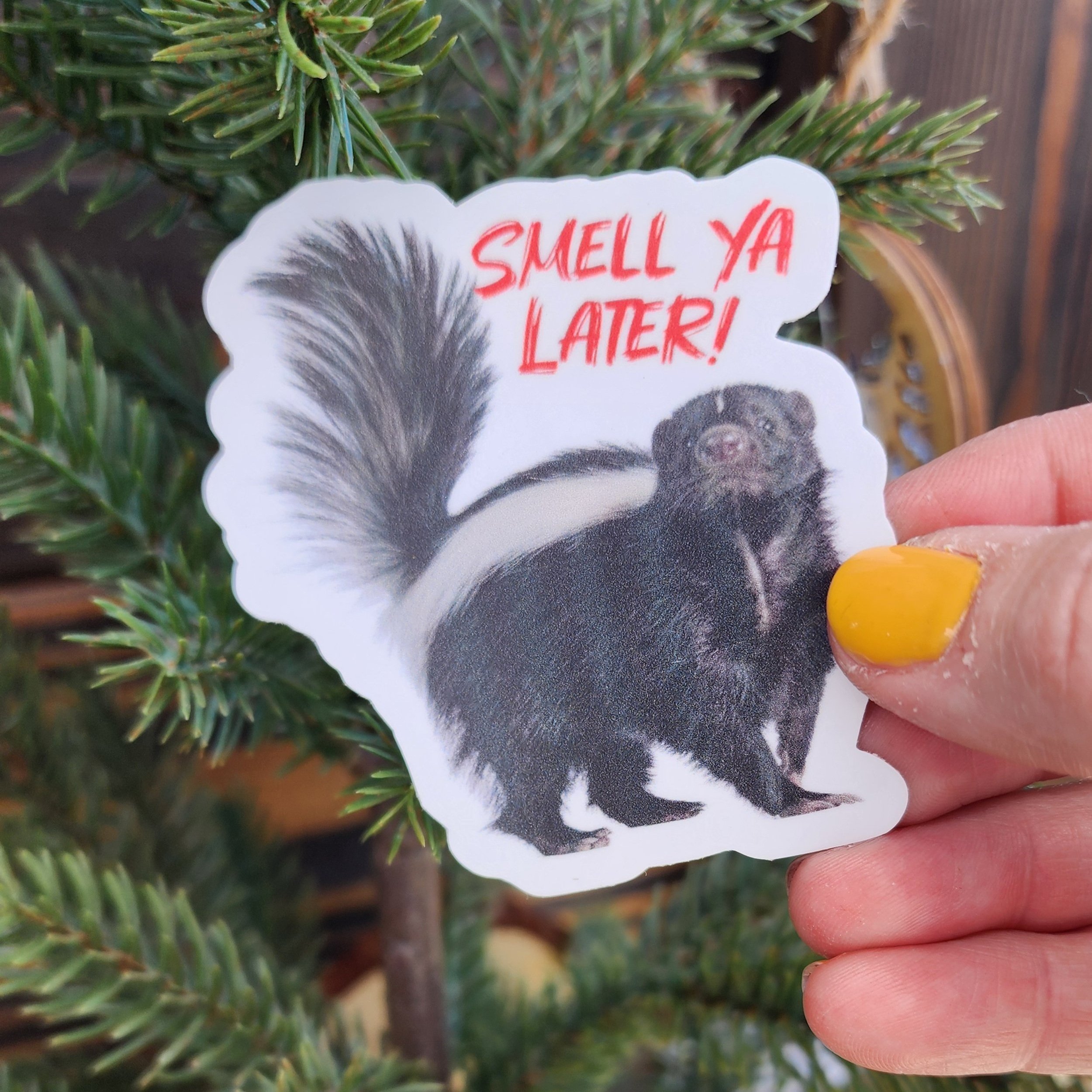 Skunk sticker that say's Smell Ya Later in Red Lettering