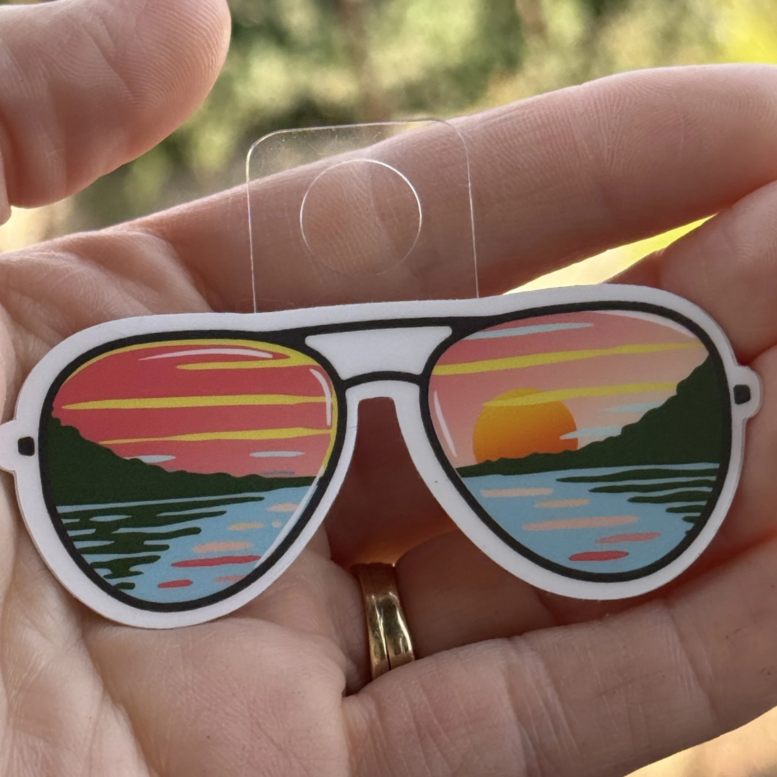 3: sunglass sticker with hang tag