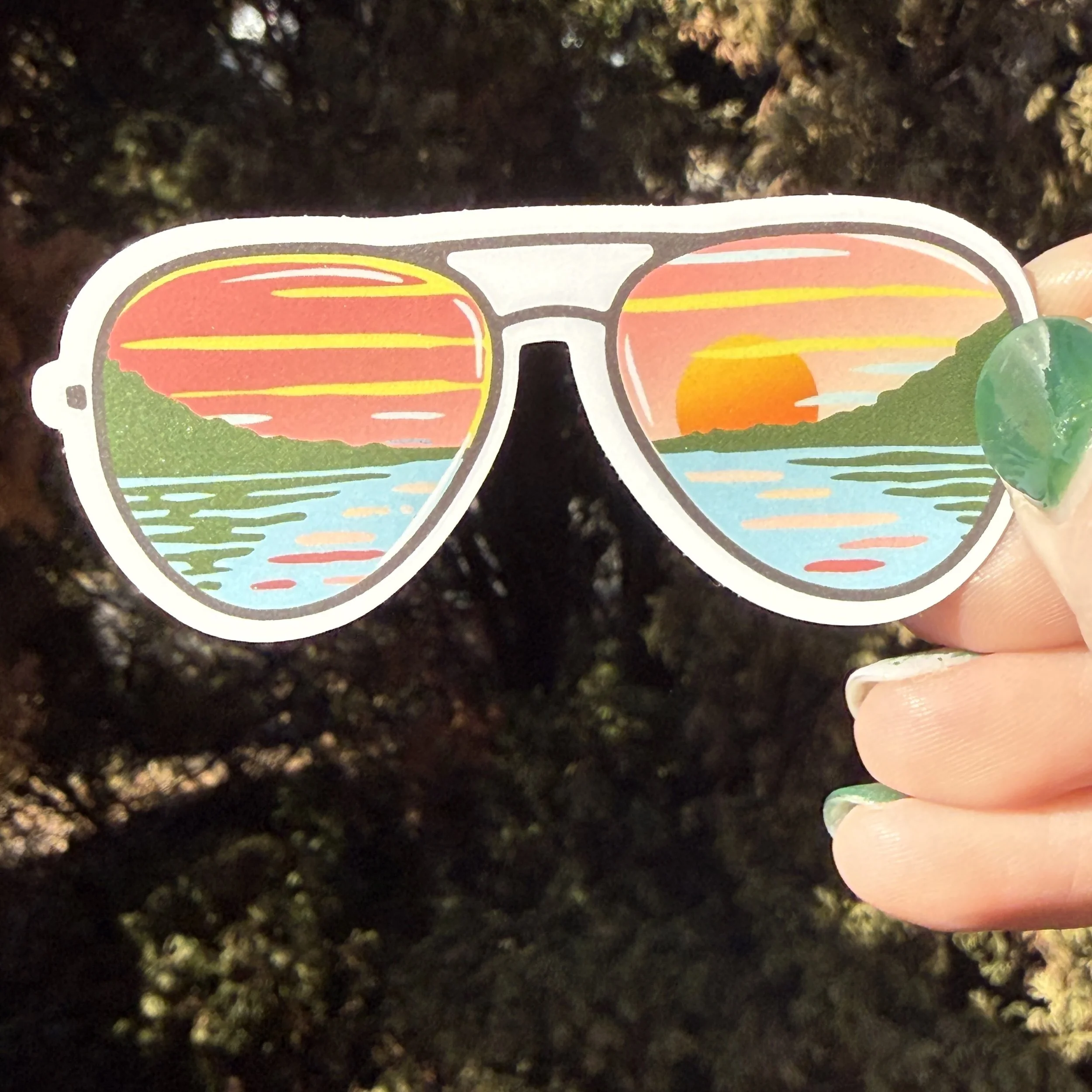4 inch vinyl sunset lake sunglasses sticker with colorful reflection