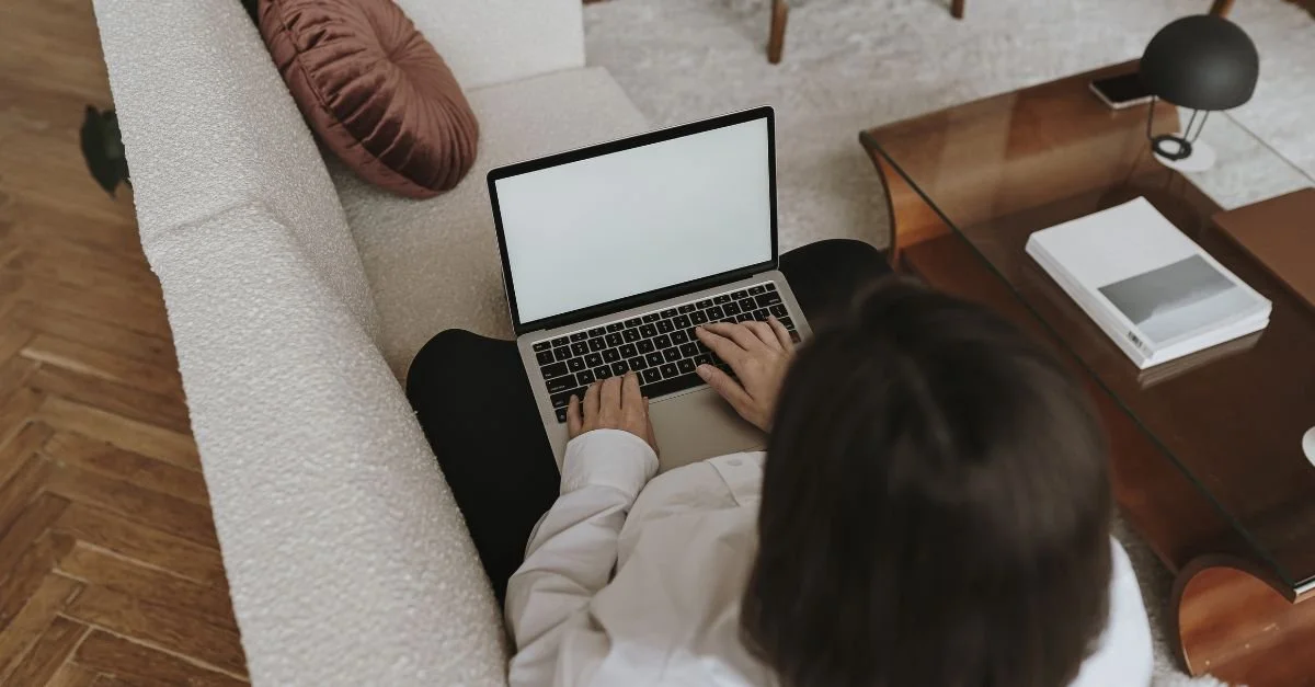 anna from your ajency working on her laptop to improve her website SEO