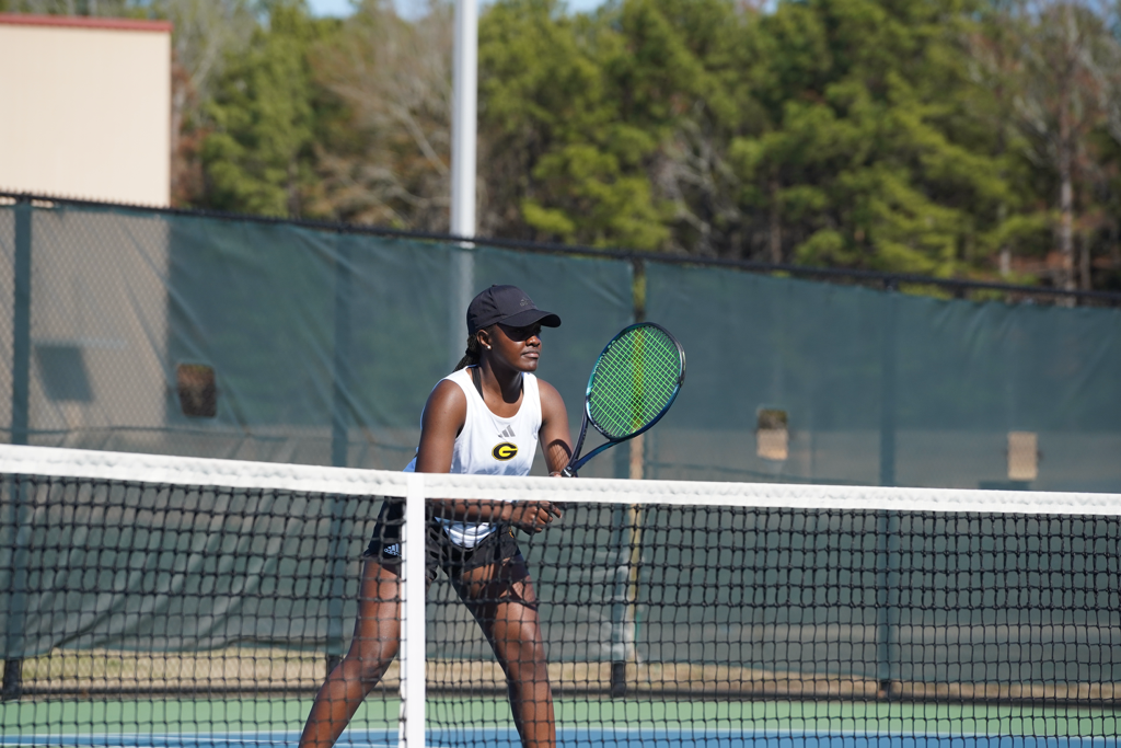 Coach Claire, former Division tennis player and tennis coach at Franco Racquet Sports