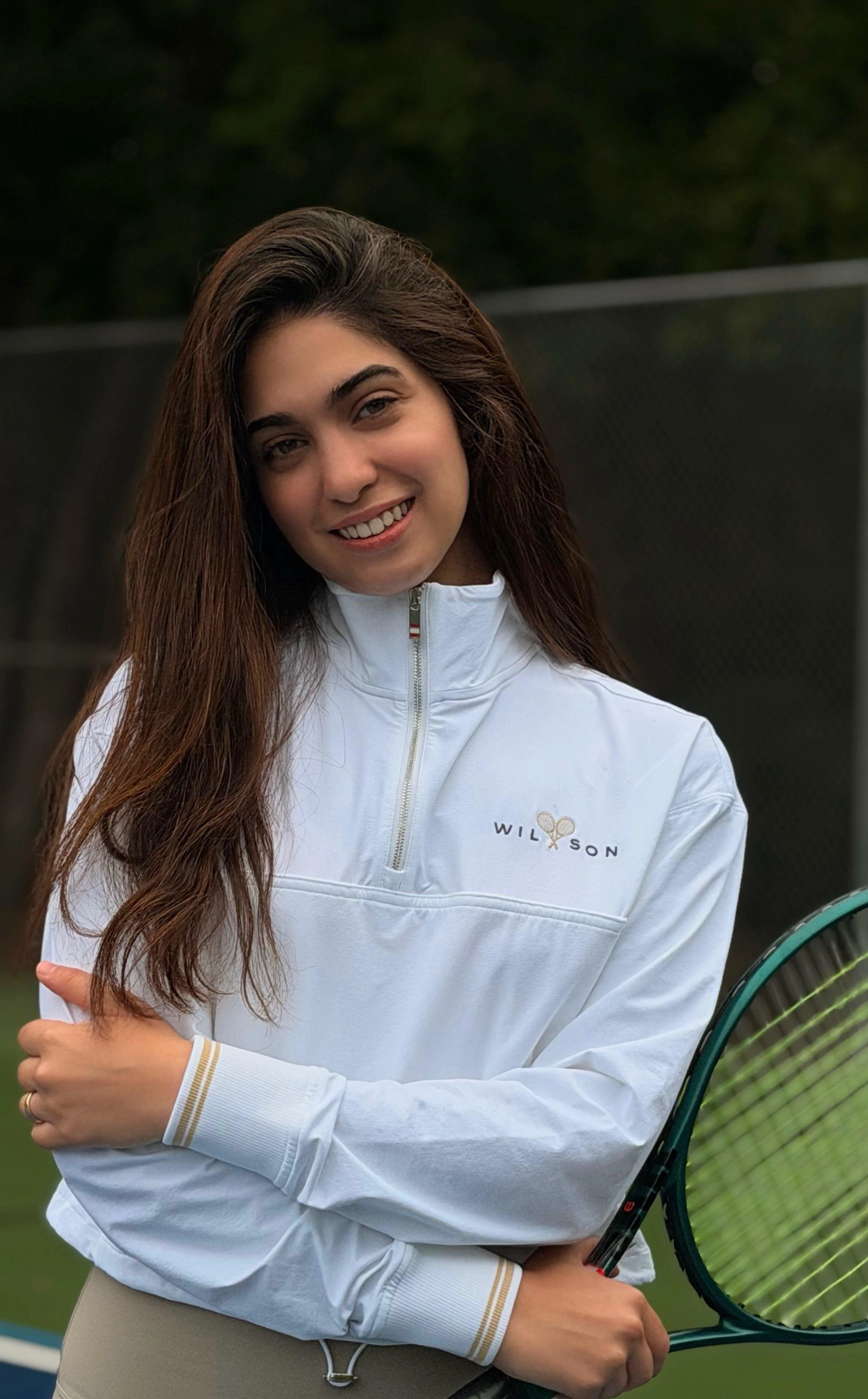 Coach Kimia teaching tennis in Dallas, TX, helping beginner and intermediate players improve technique and confidence on the court.