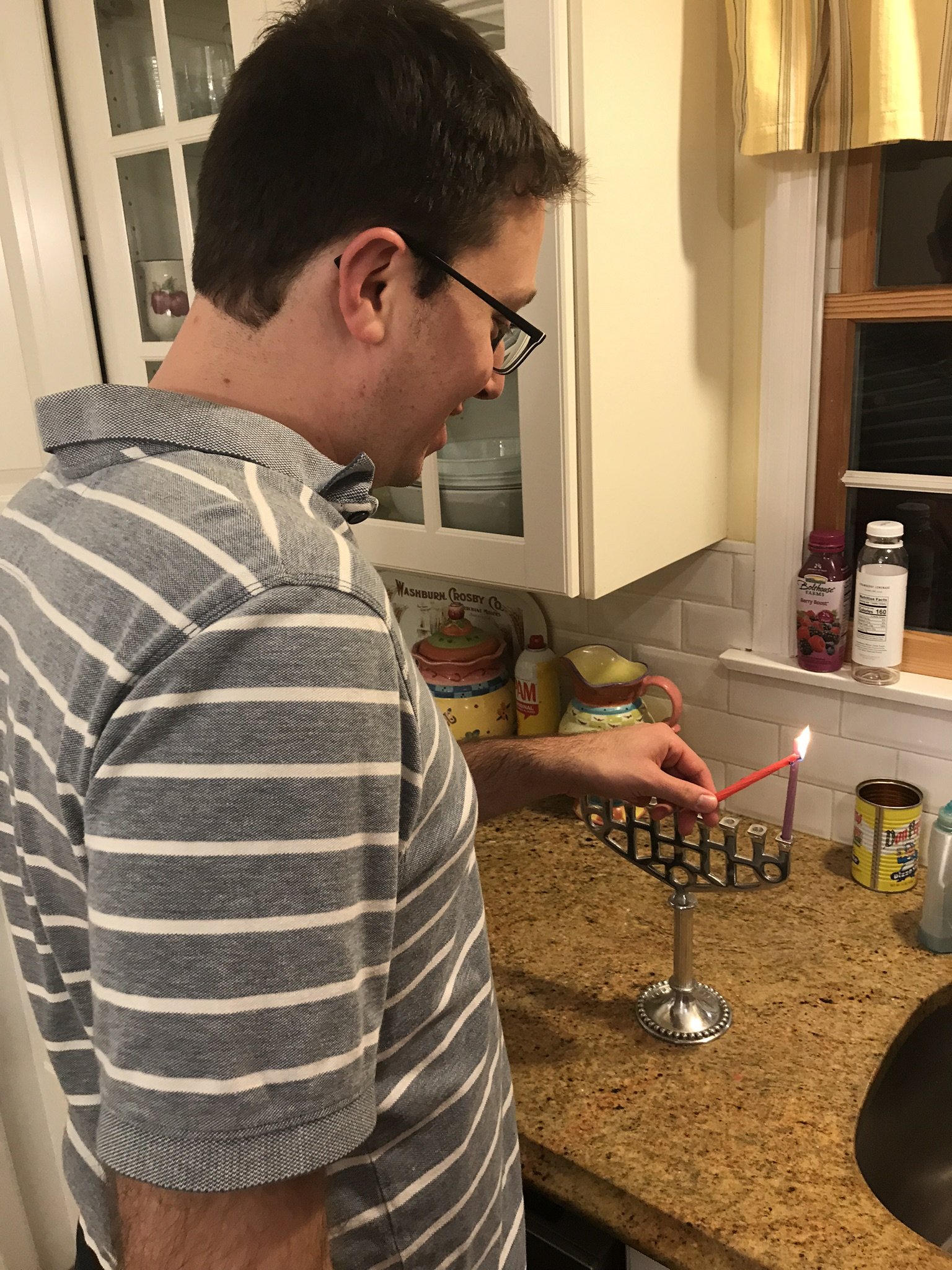 Lighting the menorah.jpeg