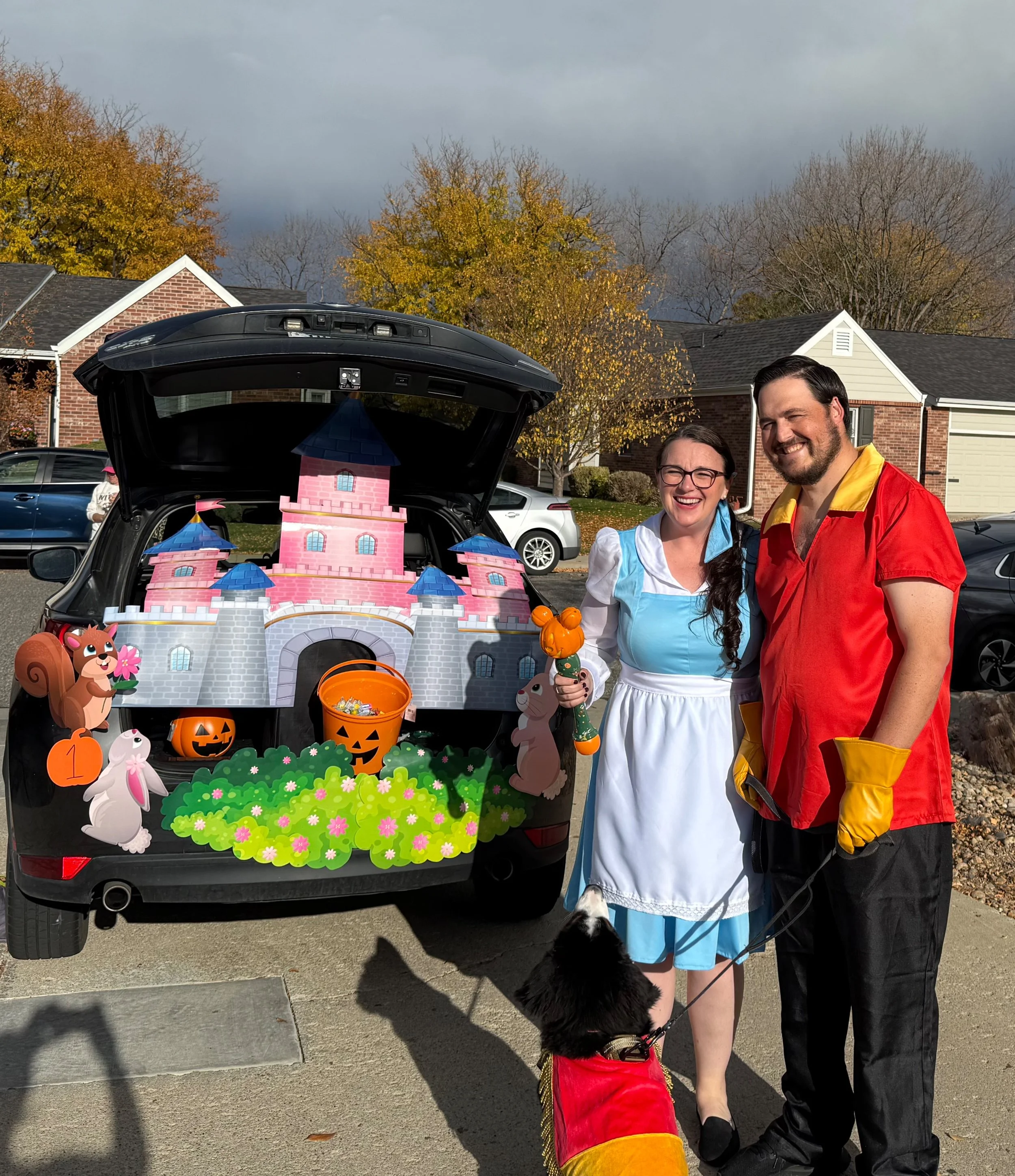 Angie and Russ as Belle and Gaston for Trunk or Treat.jpeg