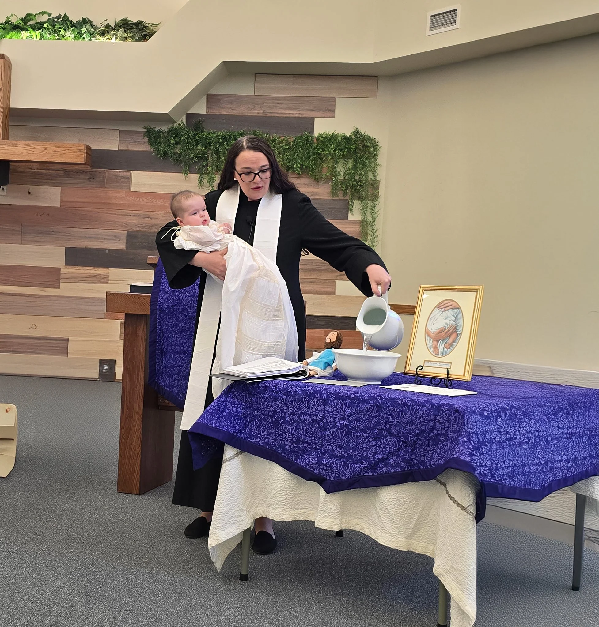 Angie Baptizing Baby copy.jpg