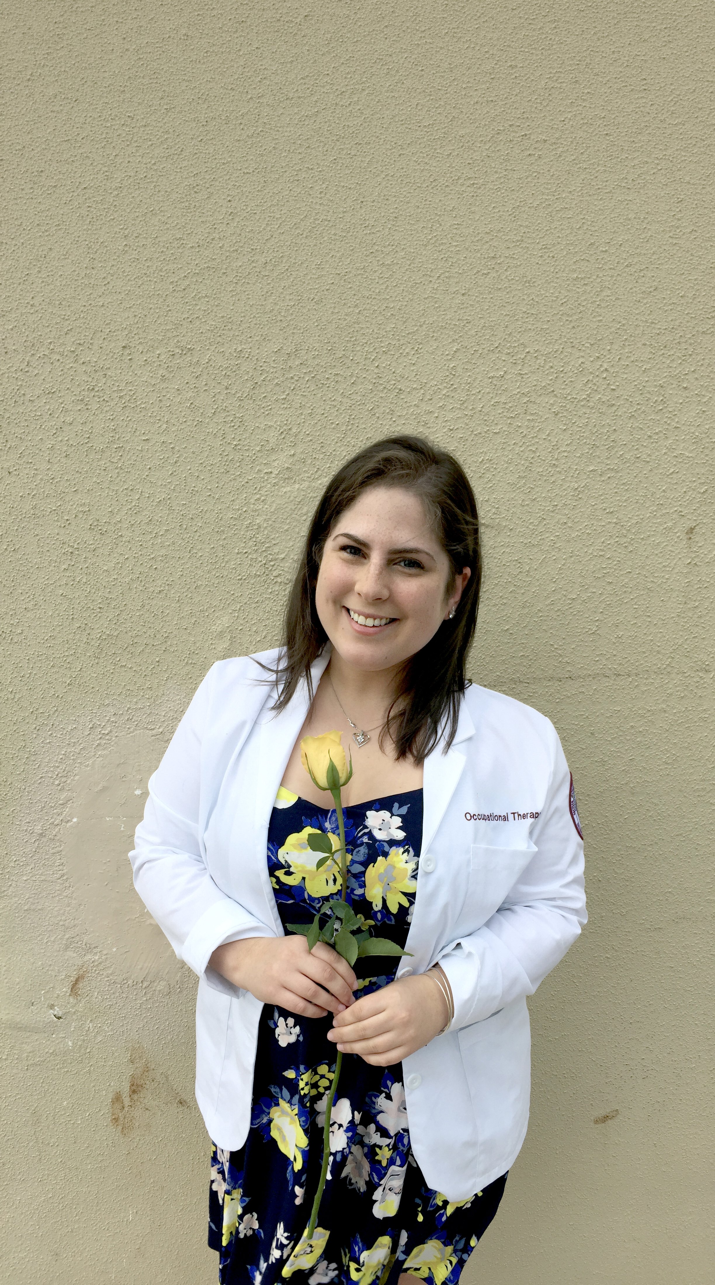 Wearing her white coat in graduate school copy.jpg