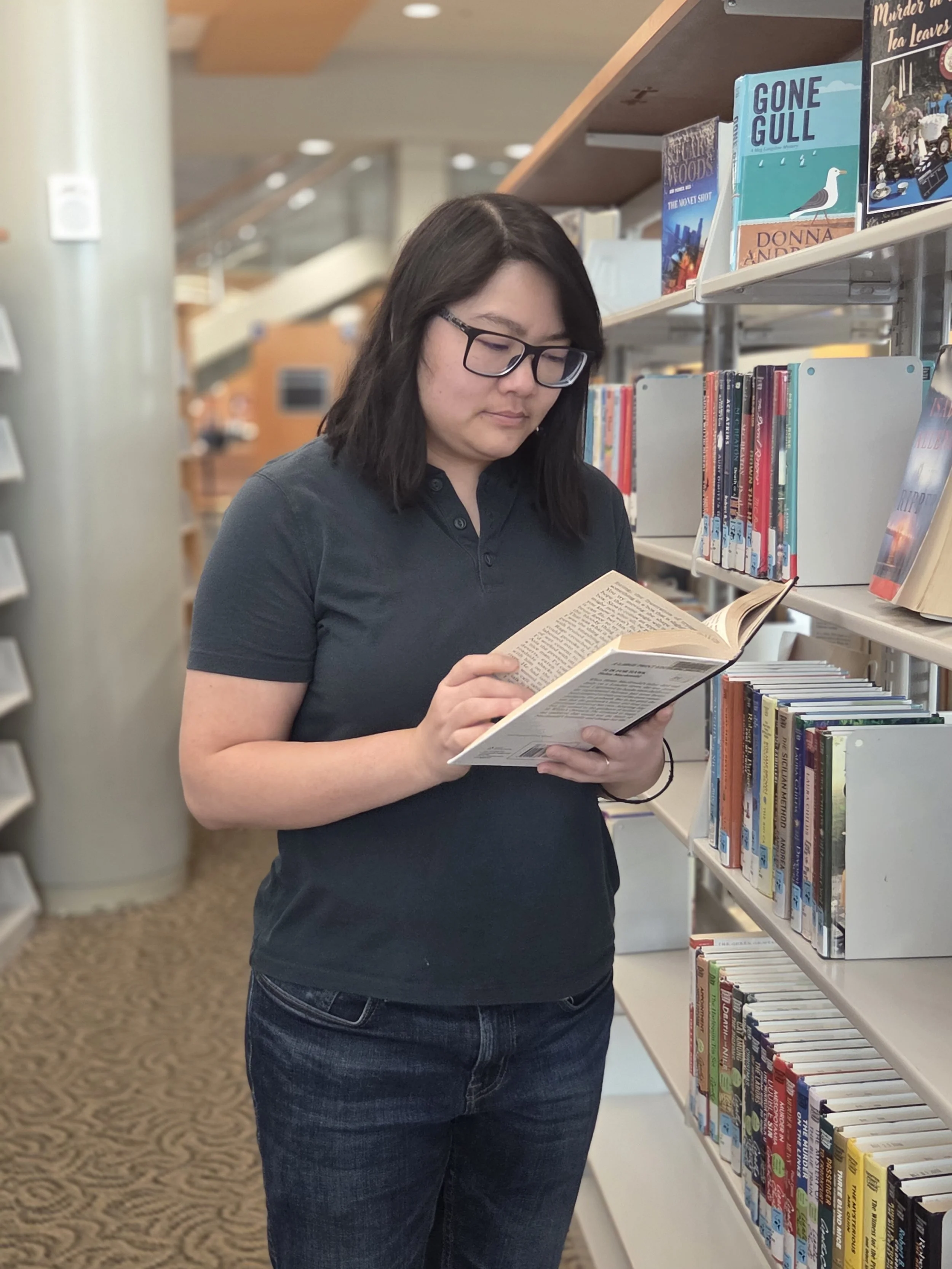 Taissa loves reading and supporting local libraries.jpg