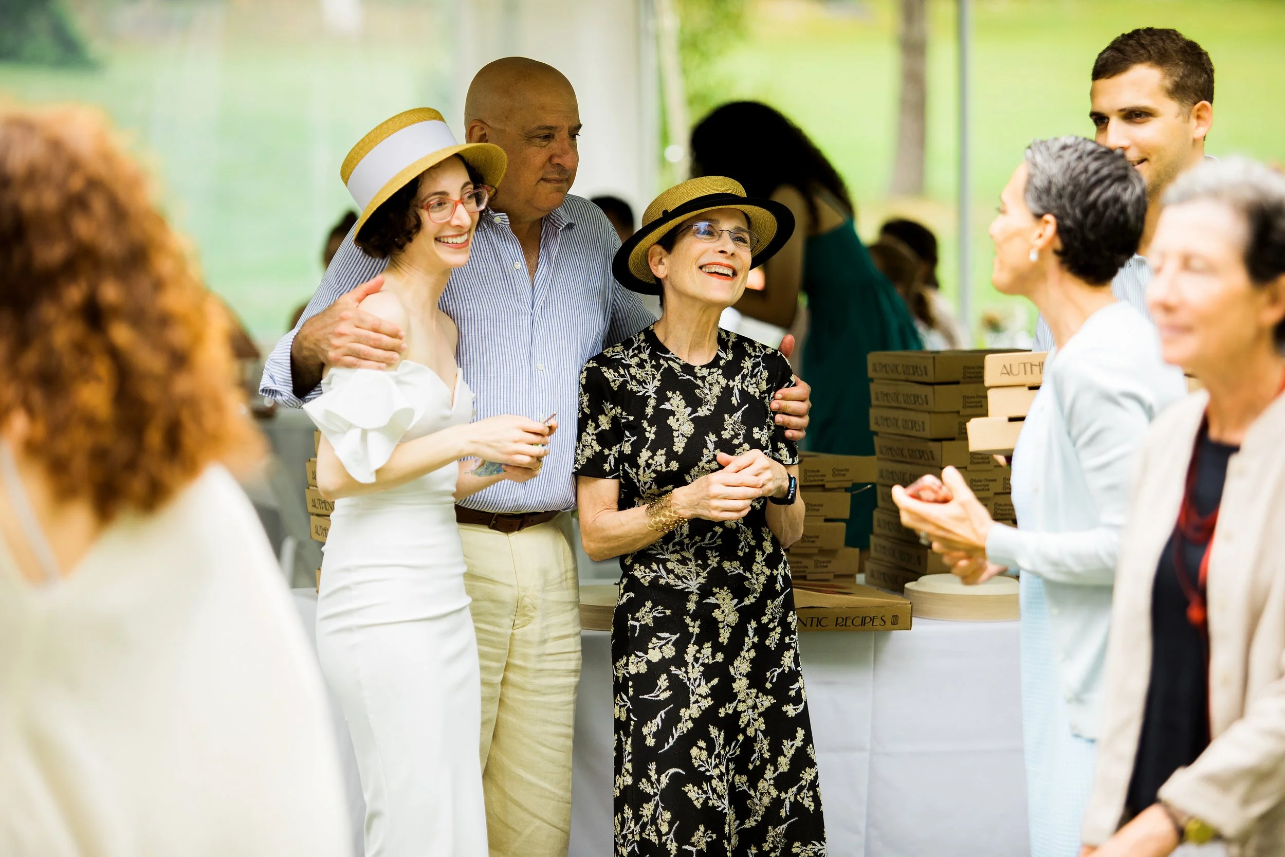 Rosie and Her Parents Chatting with Family at One Year Anniversary Party.jpg