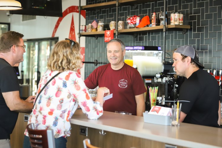 Starr Hill staff chatting with customers