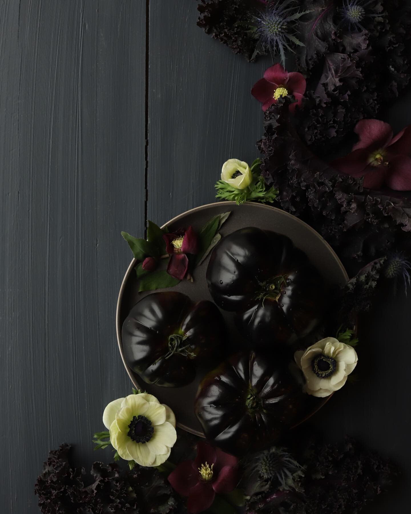 February&rsquo;s theme for @foodartproject is BLACK! I instantly gravitated towards these black heirloom tomatoes to be the hero of the image. Their gorgeous color was perfect for the assignment and I was able to create this still life with the help 