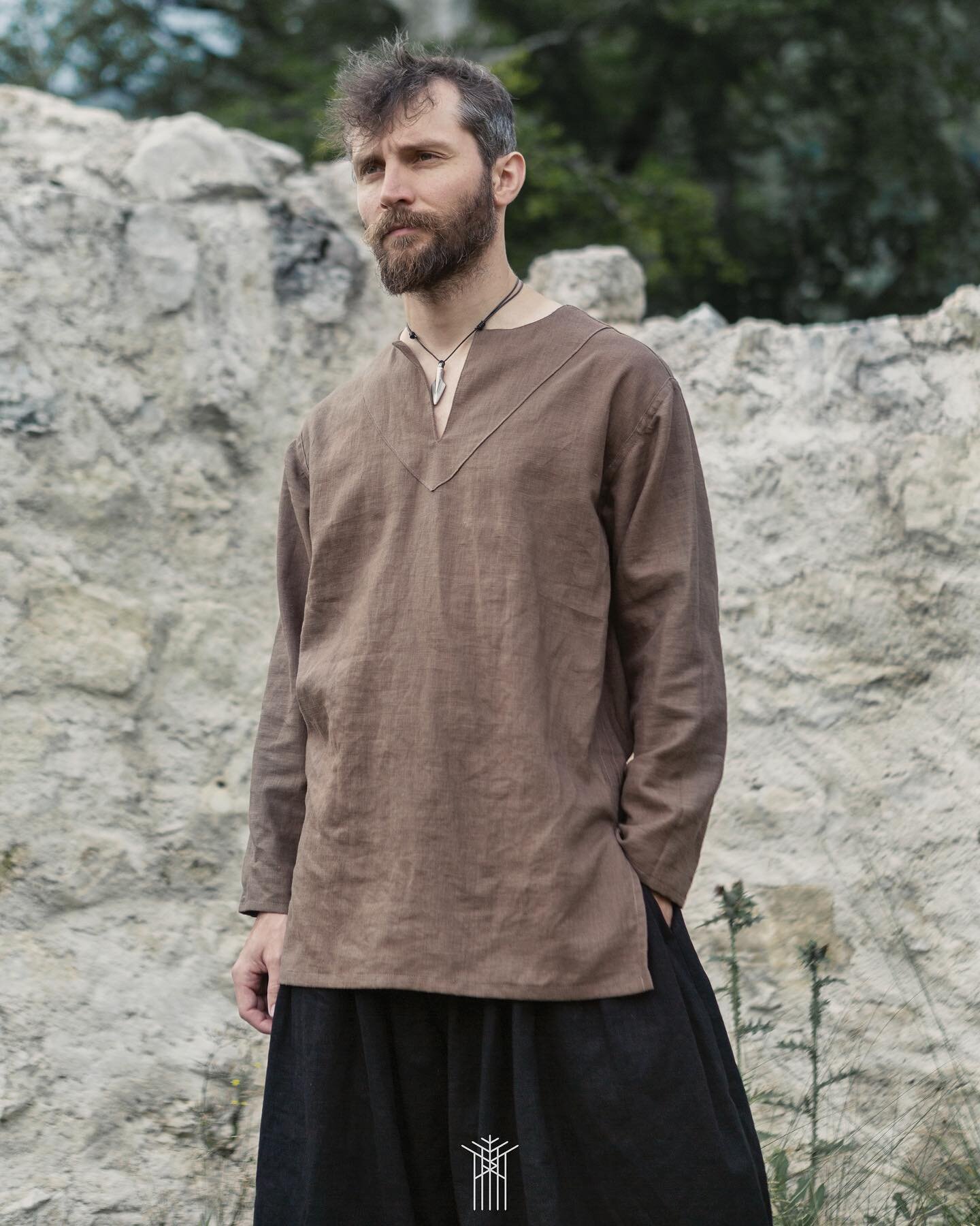 Medieval linen tunic

The pattern of this tunic may look simple, yet it is very detailed and elegant. The front and back part are identical except for the collar and lenght. The sleeves are made from one piece and all seams are beautifully executed t