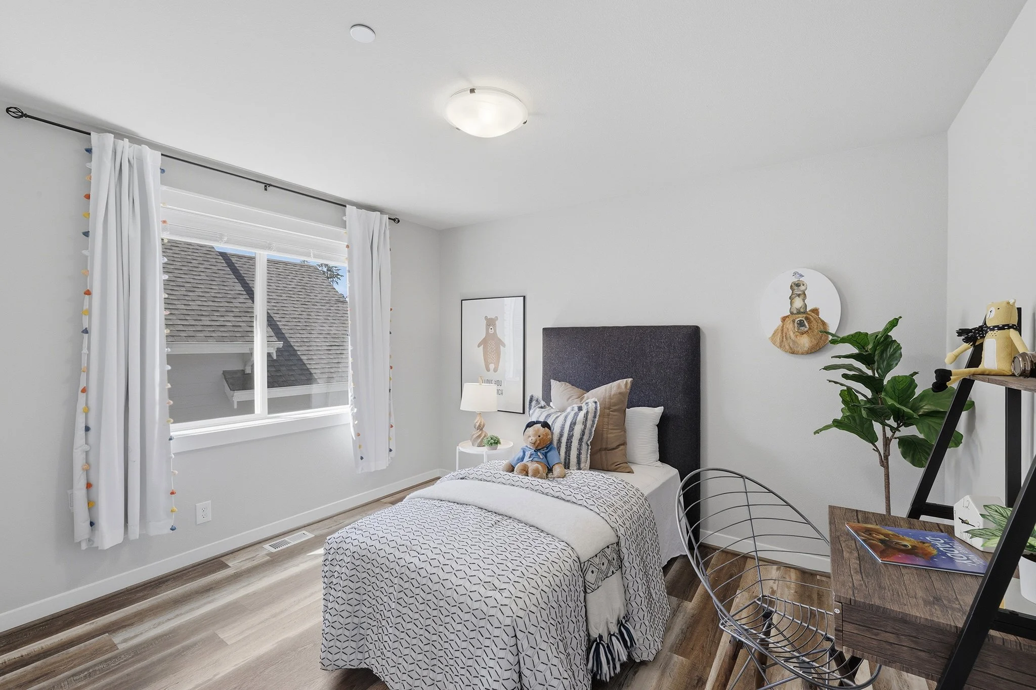 Secondary bedroom with reading nook and ladder shelving, Hawthorne Park Redmond home