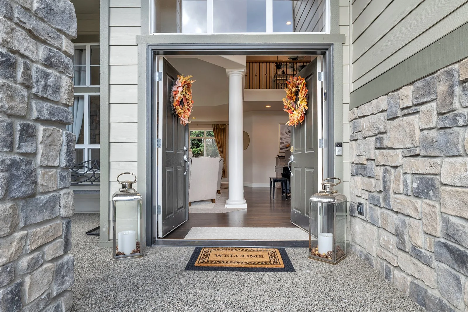 Stone-accented front entry with covered porch — Mill Creek Meadows Bothell home -2.jpg