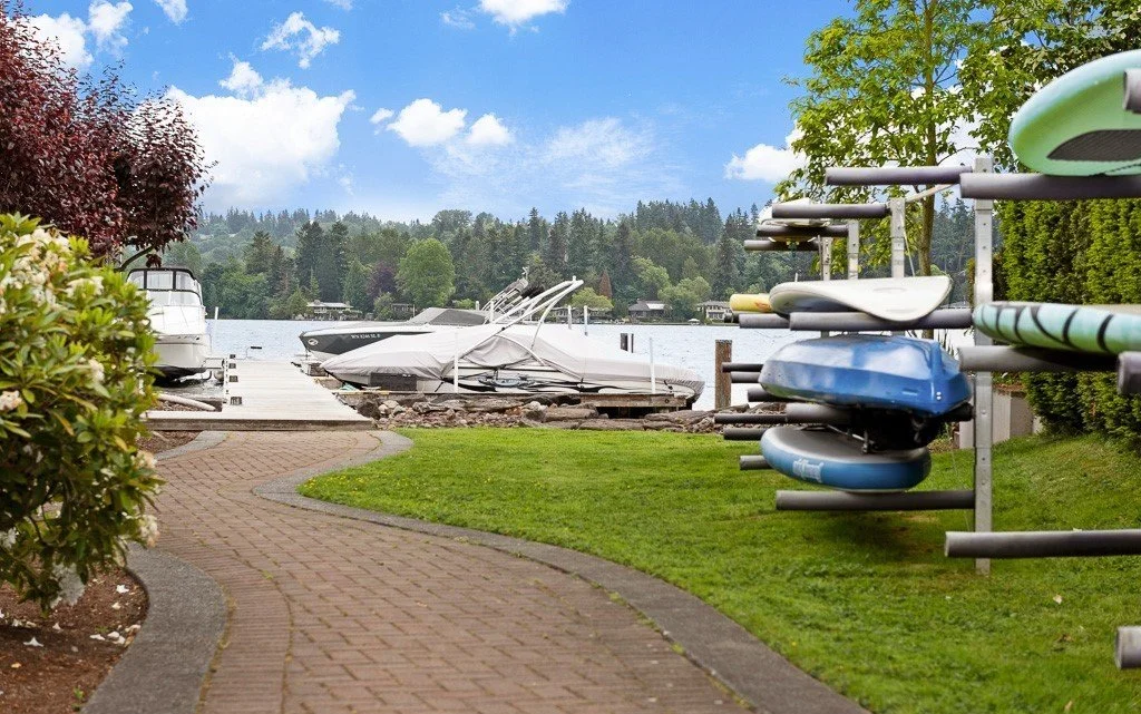 Kirkland waterfront lifestyle with boats, paddle boards, swimming and private docks in North Juanita Beach