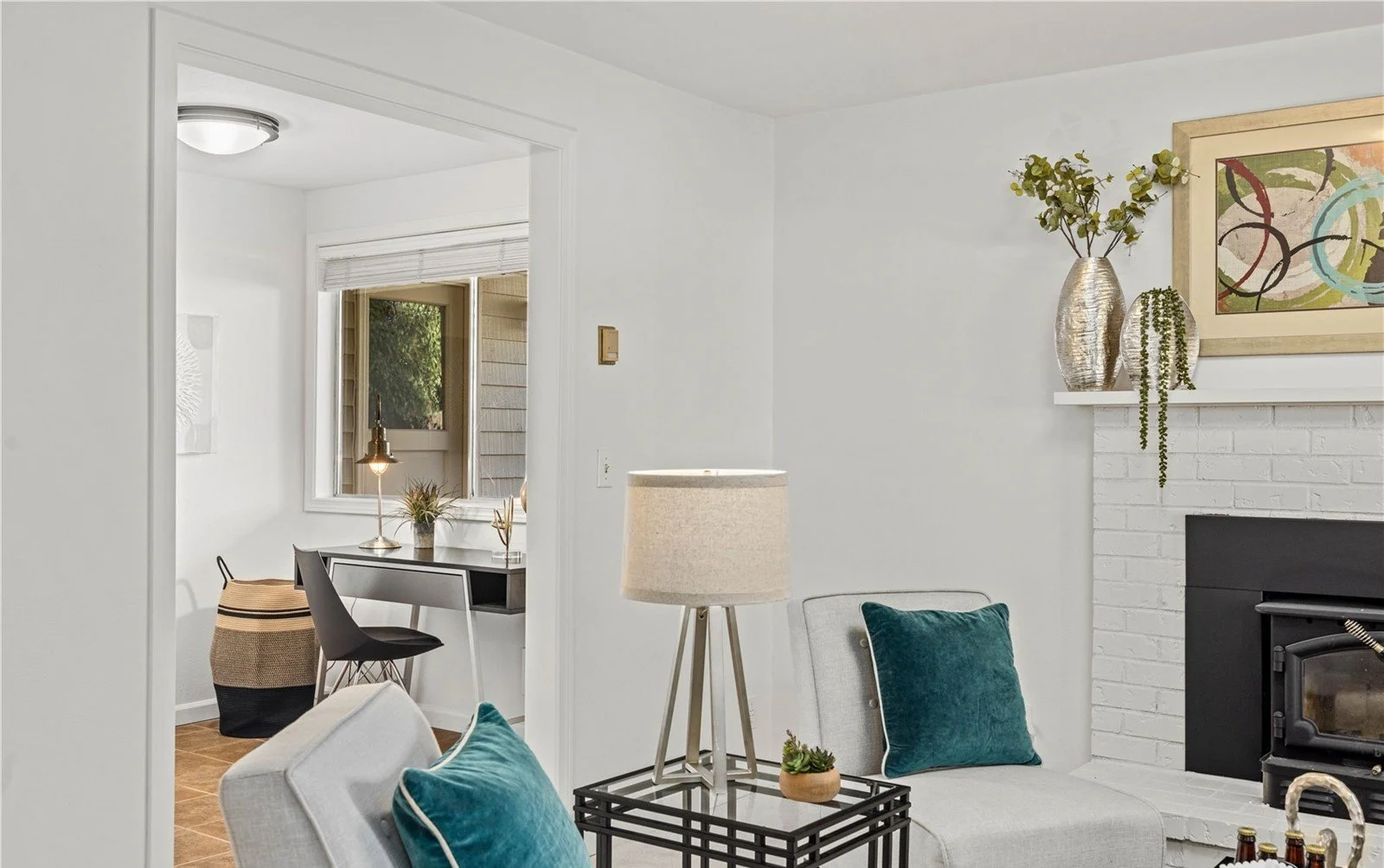 Open concept living space with high ceilings and natural light in South Cove Issaquah home purchased through buyer representation services