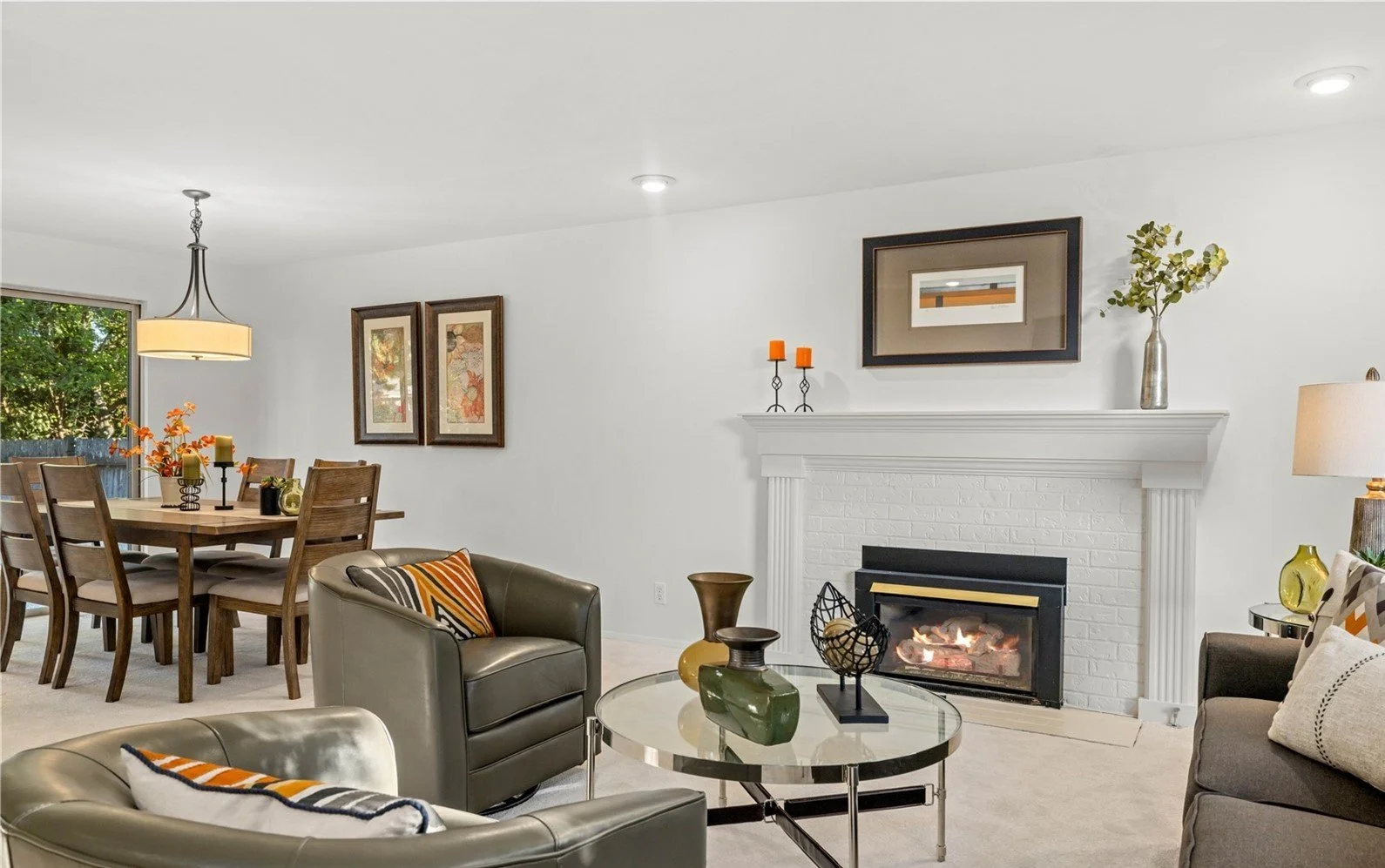 Cozy family room with gas fireplace and professional staging in South Cove Issaquah property represented by Freddy Delgadillo