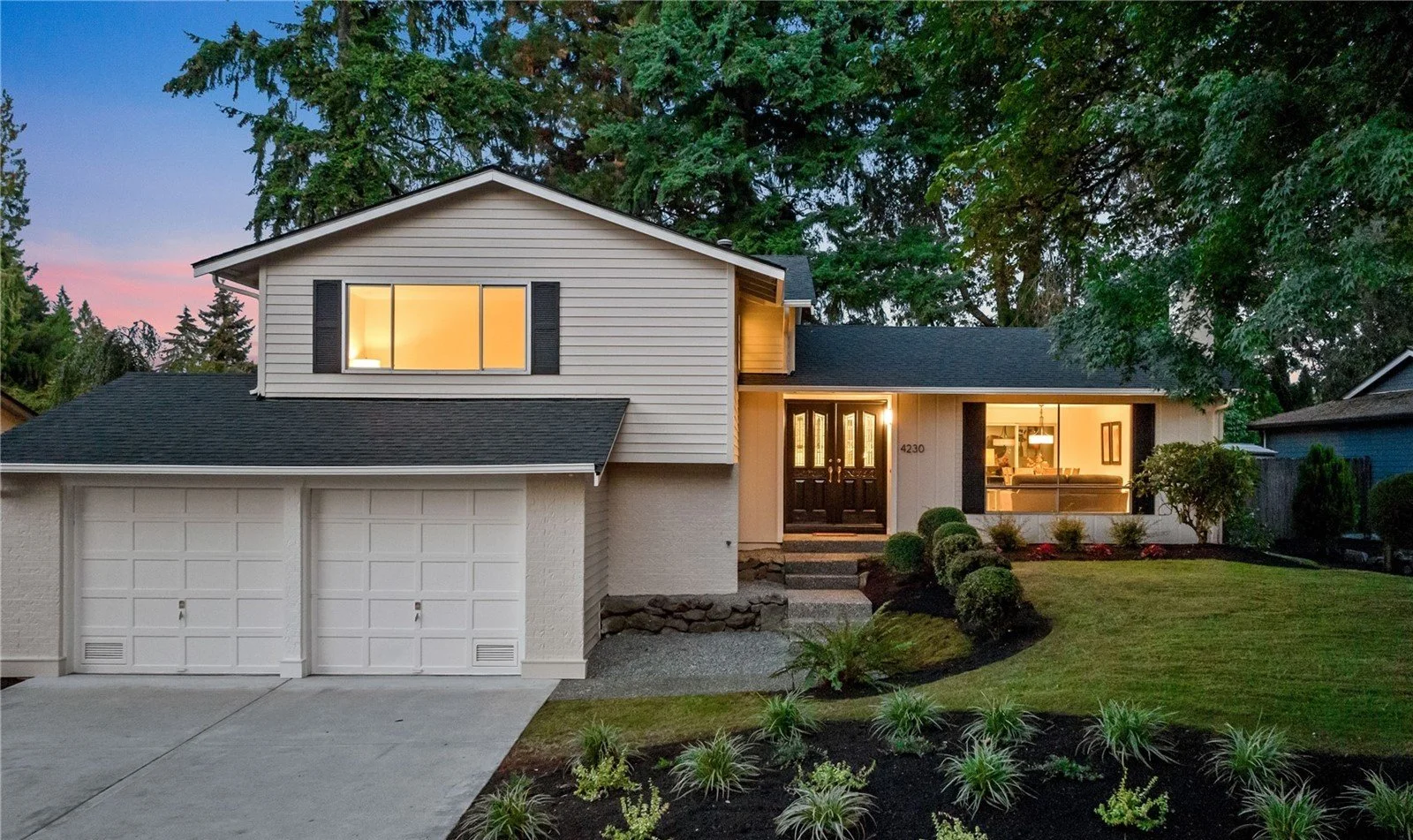 Modern updated home exterior at 4230 189th Avenue SE in South Cove Issaquah sold by Freddy Delgadillo with landscaped yard and contemporary design