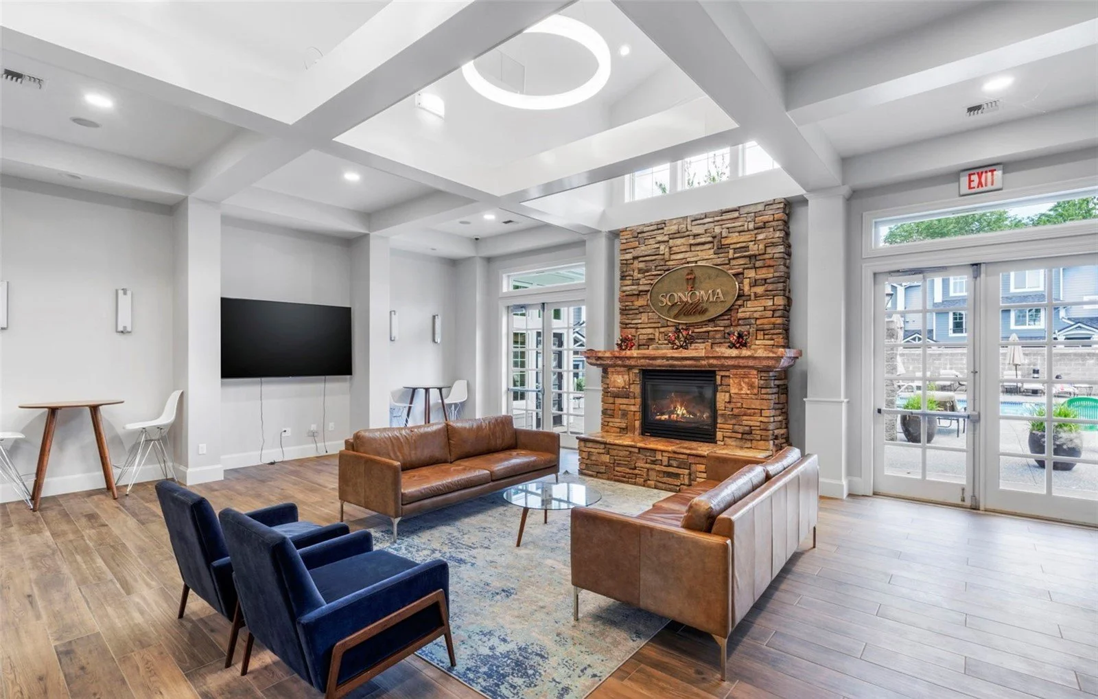 Sonoma Villero clubhouse interior in North Kirkland featuring modern finishes and luxury community amenities, where Freddy Delgadillo sold all 240 condominiums as master sales representative from 1999-2002