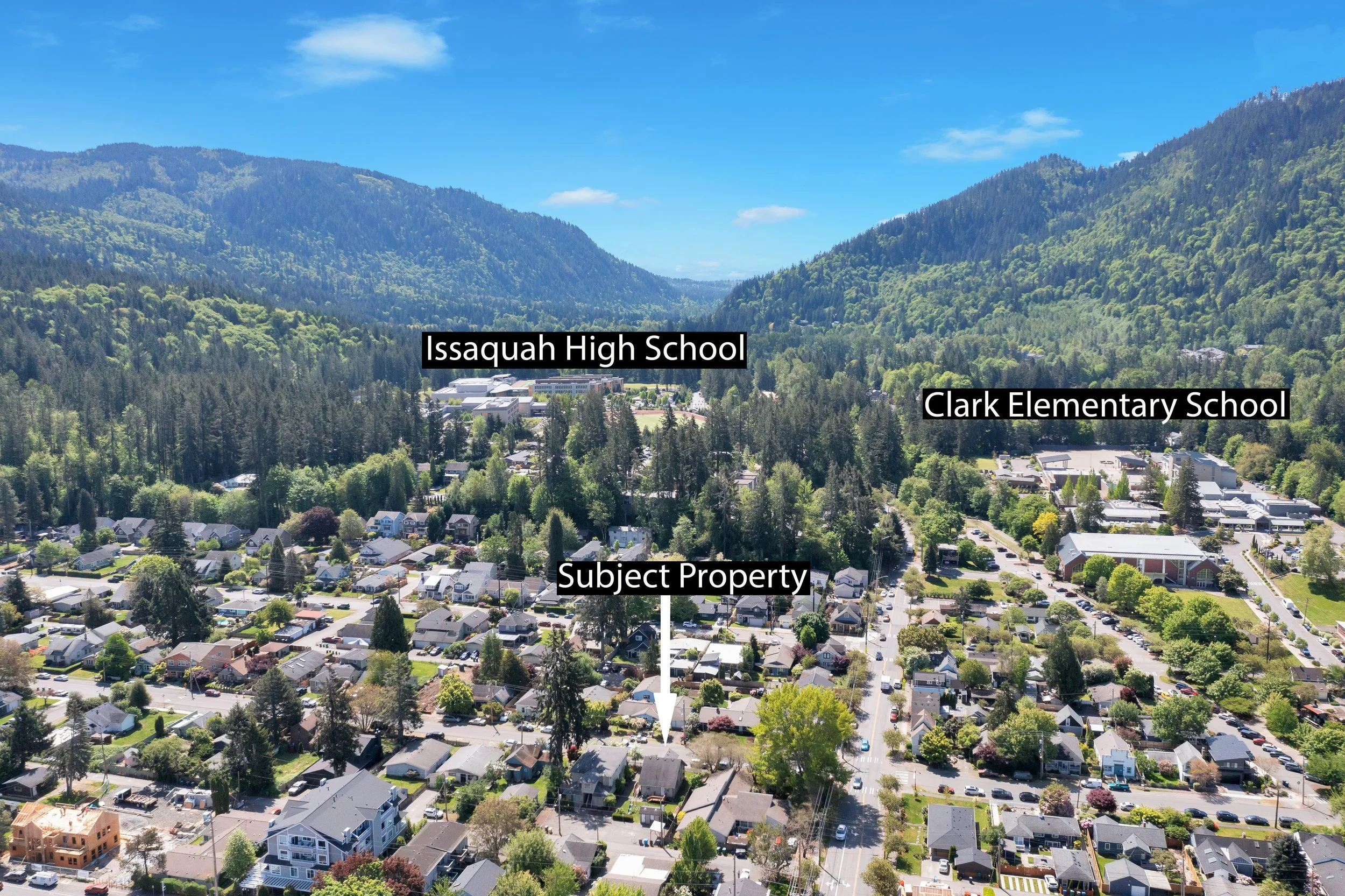 Sweeping aerial view of Old Town Issaquah neighborhood with Tiger Mountain backdrop showing the walkable downtown setting of 260 SE Andrews Street duplex — prime Pacific Northwest investment property location in King County