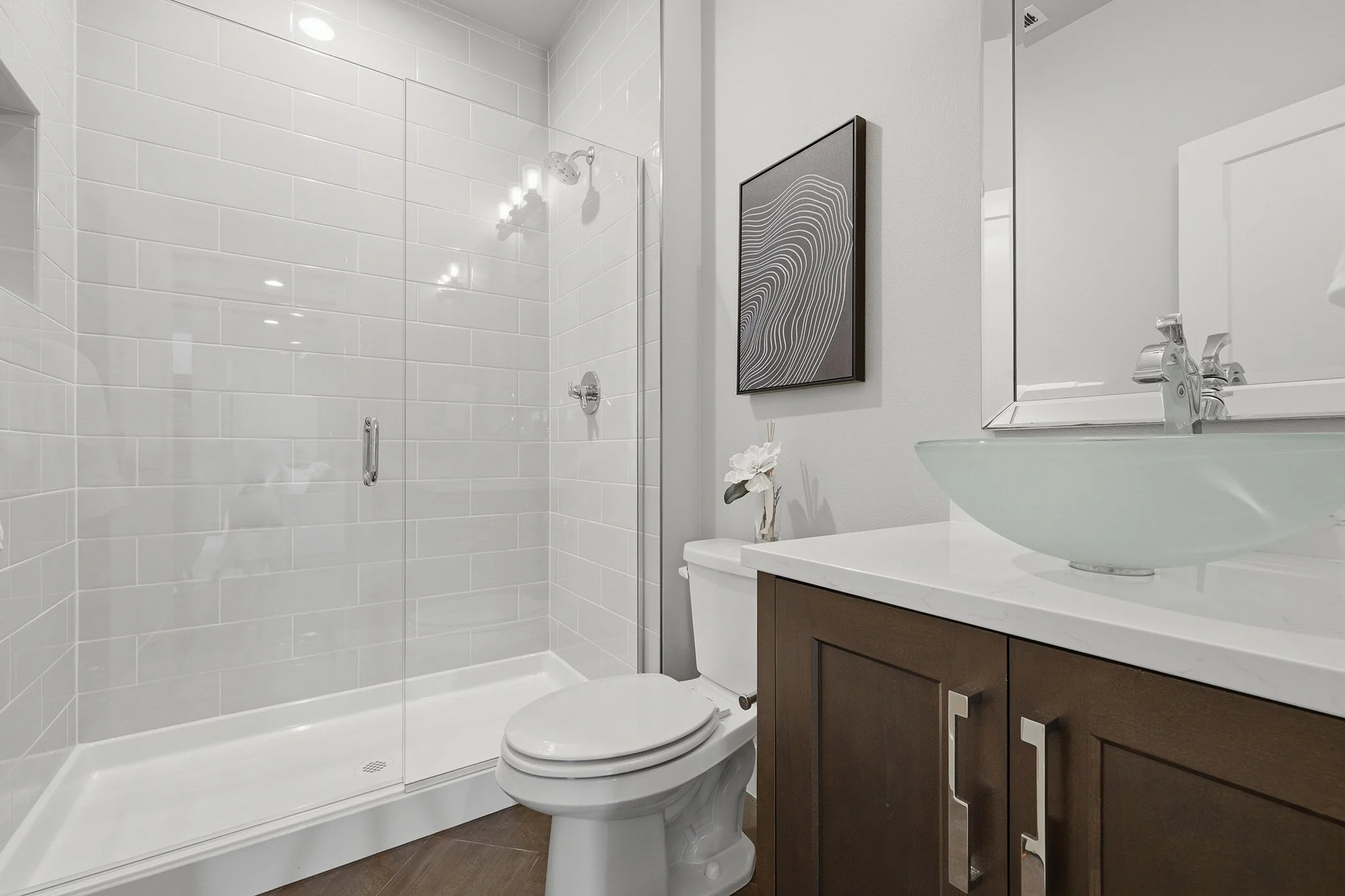 Full bathroom with glass shower enclosure and dual-tone vanity, English Hill Redmond