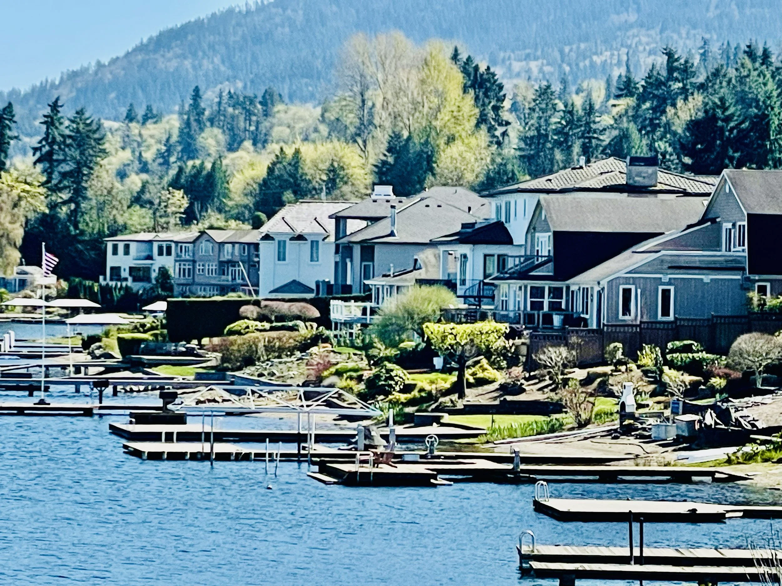 Lake Sammamish  waterfront homes on Lake Sammamish at sunset — luxury waterfront real estate Bellevue Kirkland Mercer Island and Issaquah Washington
