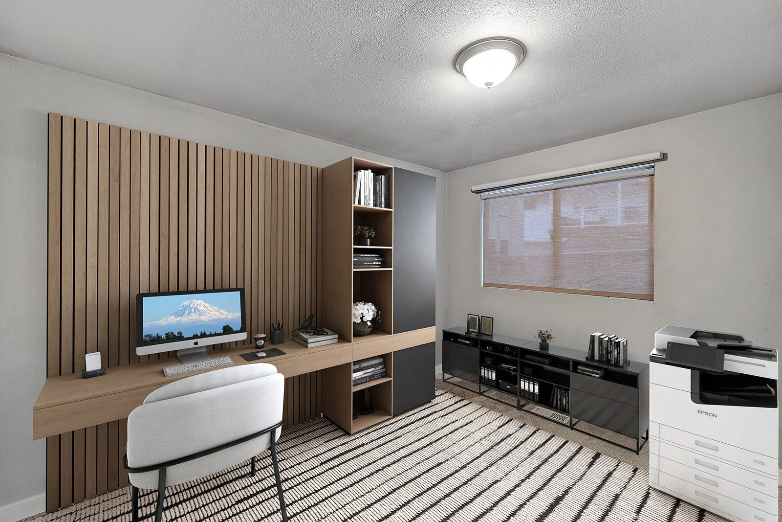 Flexible recreation room with sliding door access to backyard in Finn Hill home ideal for play space home theater or guest suite