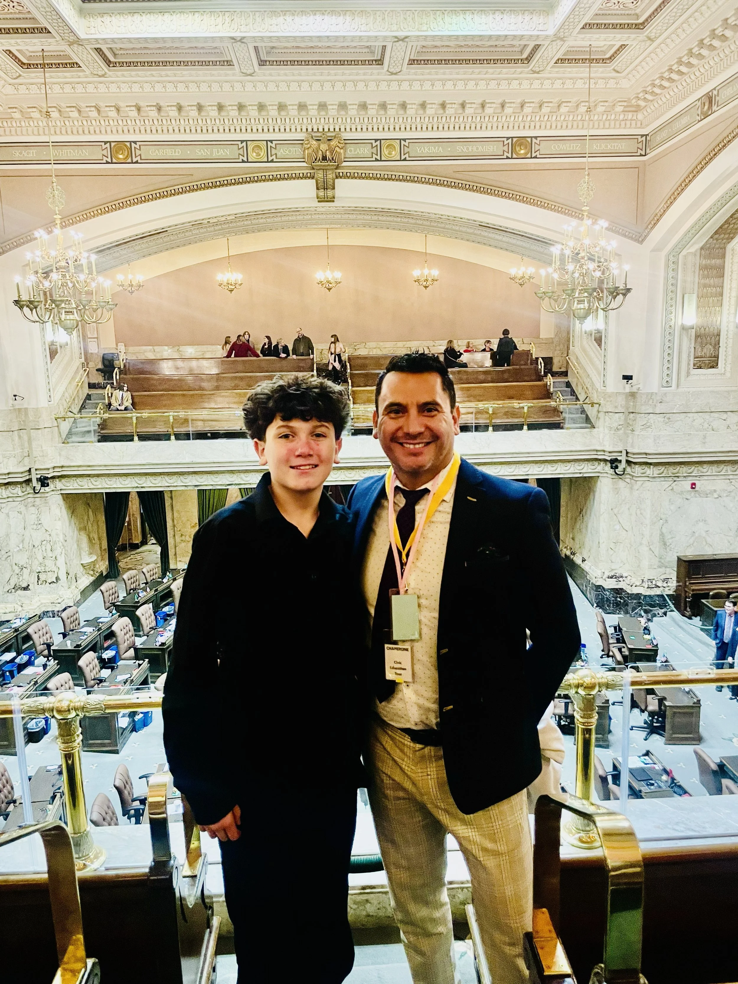 Freddy Delgadillo Judah Realty with son at Washington State Capitol Olympia