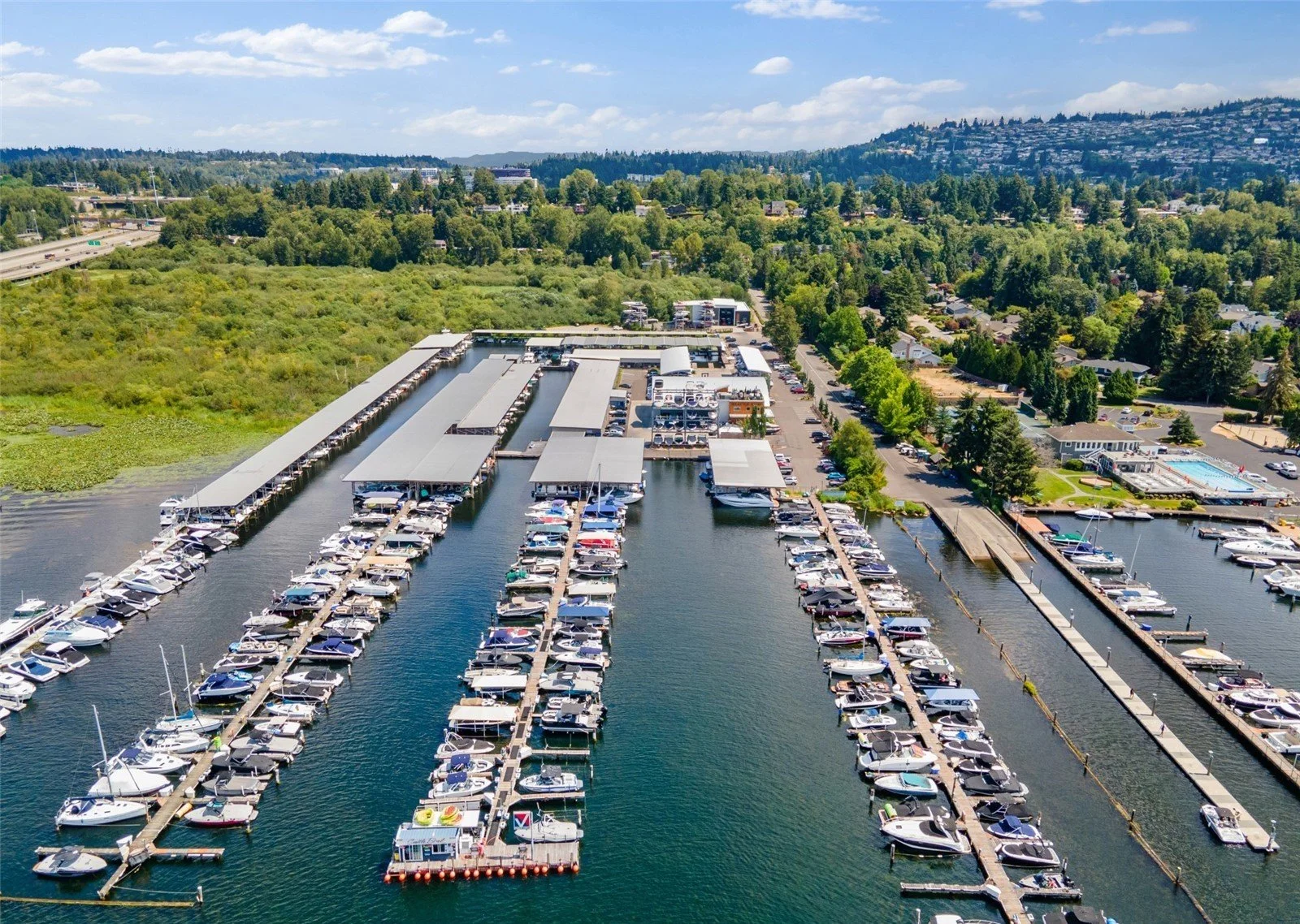 Newport Shores private boat launch and dock on Lake Washington, Bellevue WA — exclusive resident access for kayaks, motorboats, and sailboats