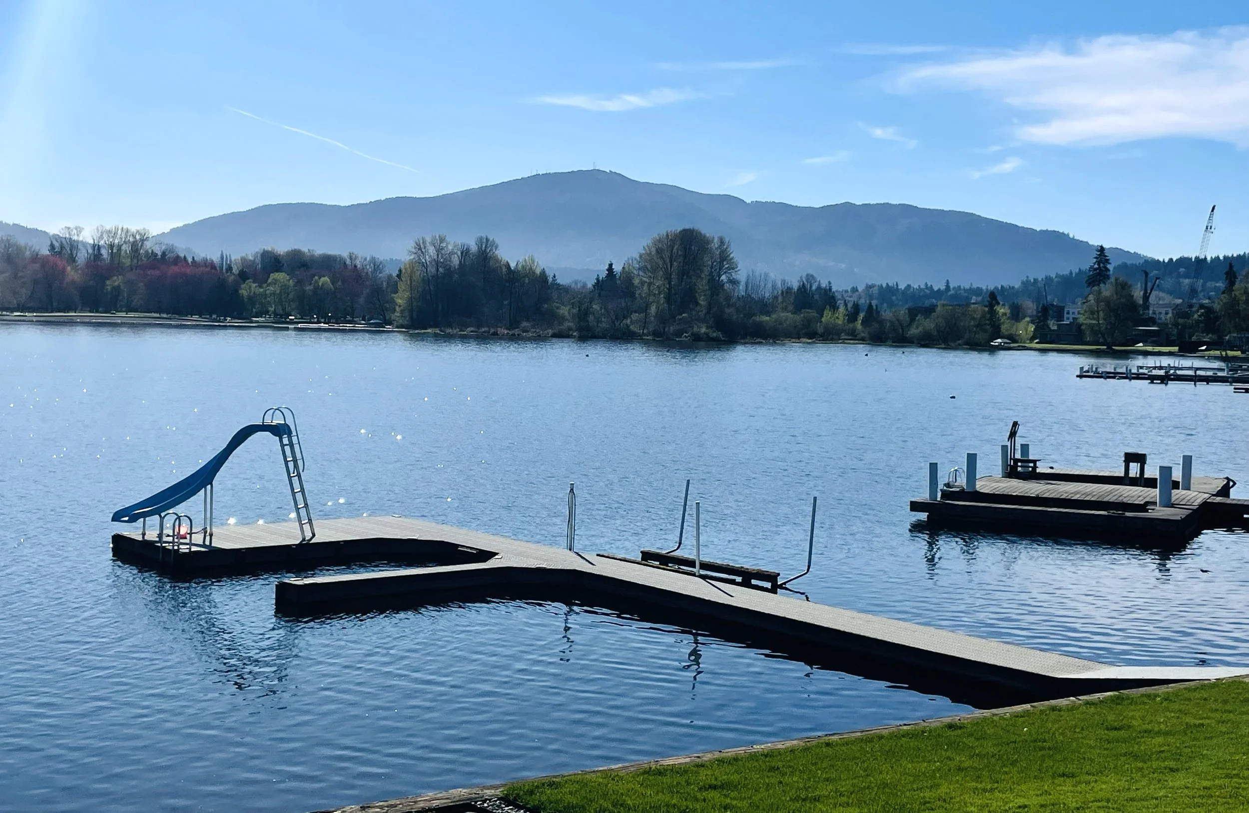 Private dock on Lake Sammamish waterfront property on a summer afternoon, Sammamish Washington