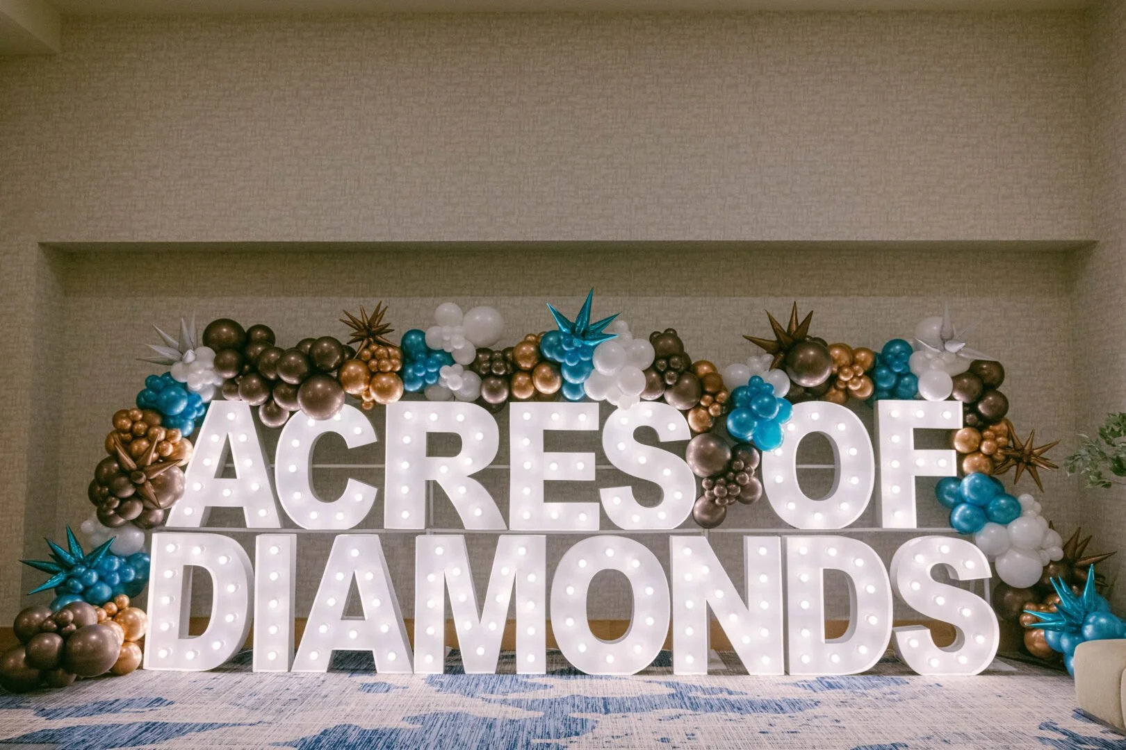 Acres of Diamonds 2026 Diamond Dinner marquee sign, Hyatt Regency Bellevue gala