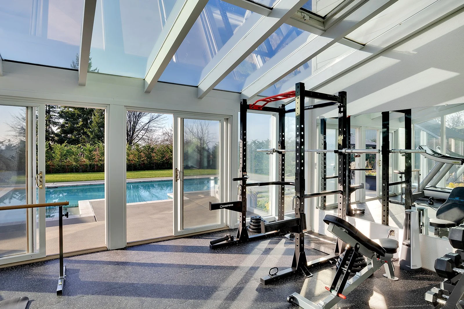 Stunning lifestyle home in Clyde Hill offering outdoor pool, gym and large yard in luxurious Clyde Hill estate