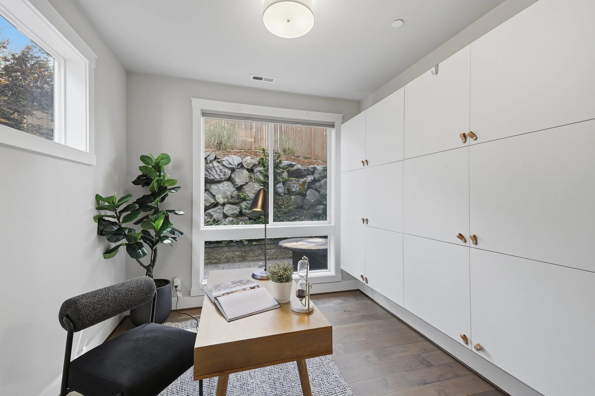Main-floor flex office or guest suite with sliding glass door, Redmond WA new construction home