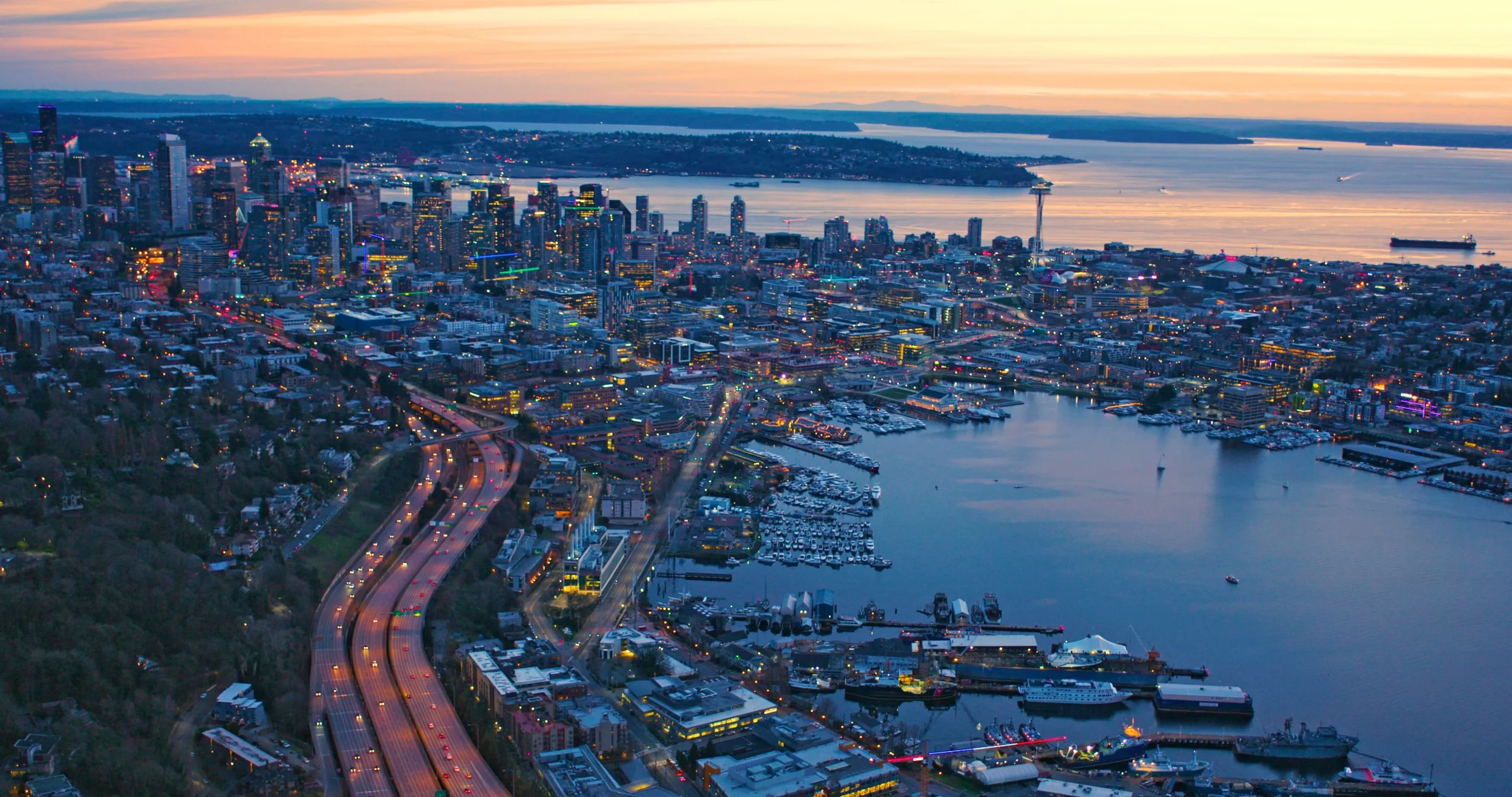 Seattle and Bellevue luxury real estate market at dusk — Pacific Northwest relocation expert Freddy Delgadillo, Realogics Sotheby's International Realty Bellevue WA