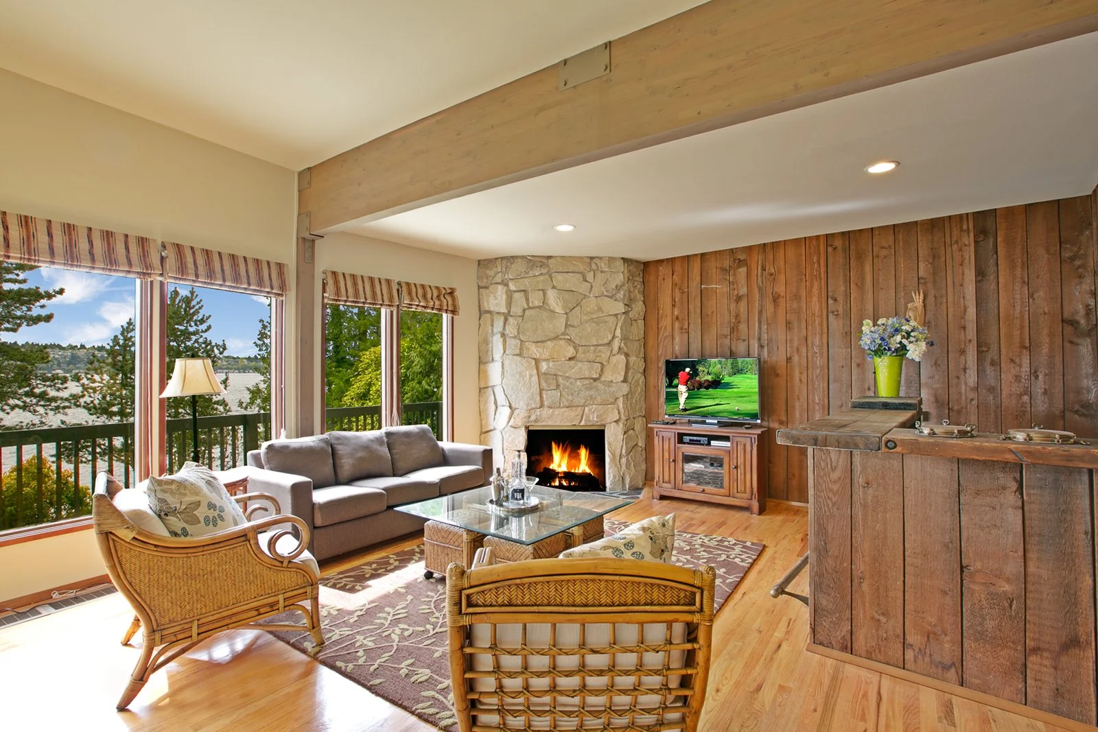 Bonus room recreation space 8383 Seashore Drive with hardwood floors and waterfront entertaining potential