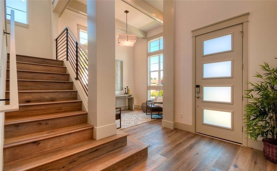 Original hardwood floors and vaulted wood ceiling in a Grass Lawn Redmond ranch home