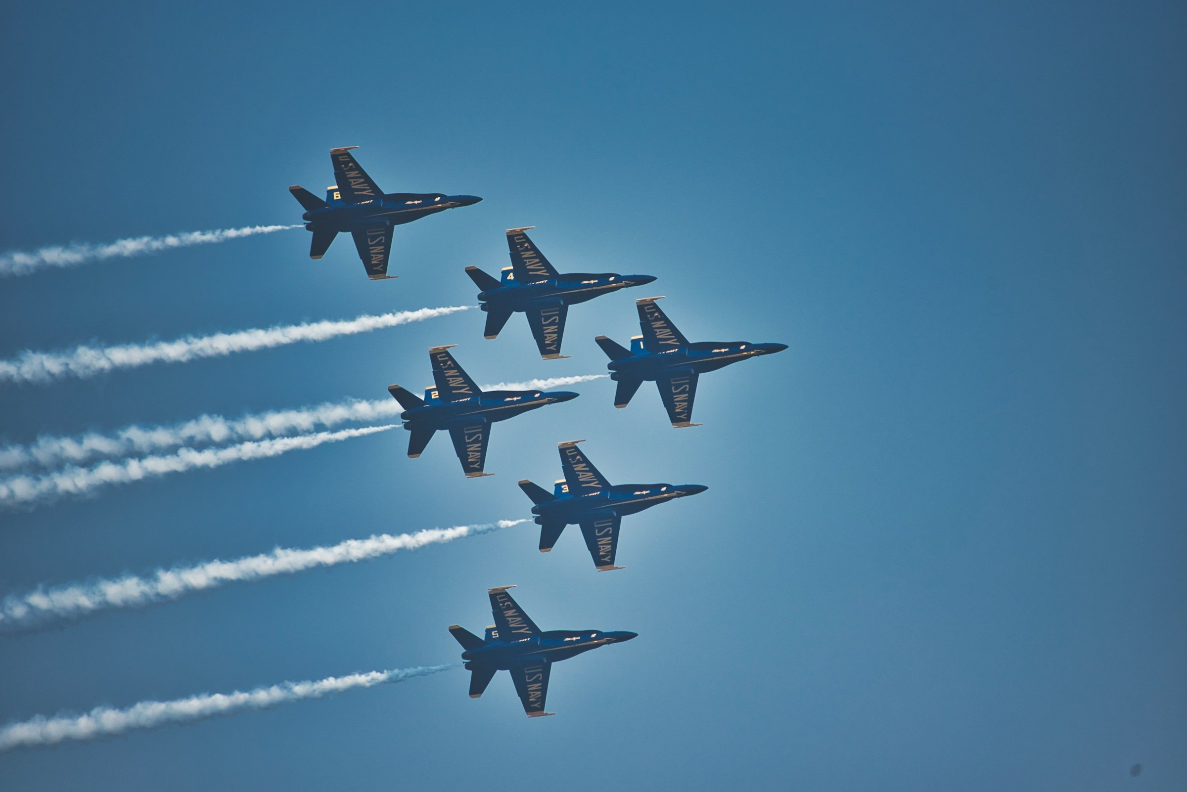 Blue Angels jets flying in formation over Lake Washington near the Eastside