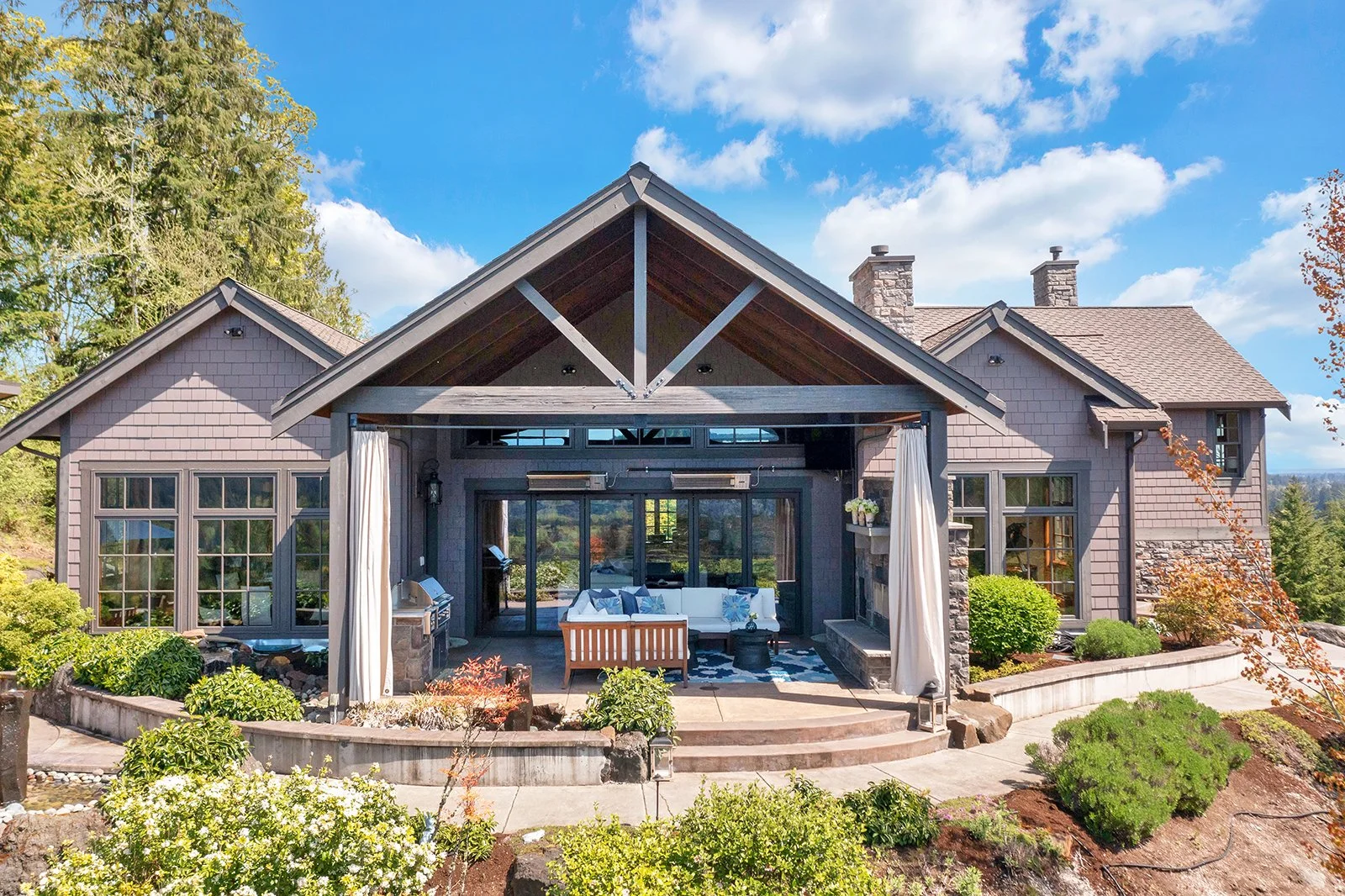 Outdoor living space luxury estate Olympia Washington gated community Sotheby's International Realty professional listing photography Pacific Northwest lifestyle Bainbridge Island luxury homes