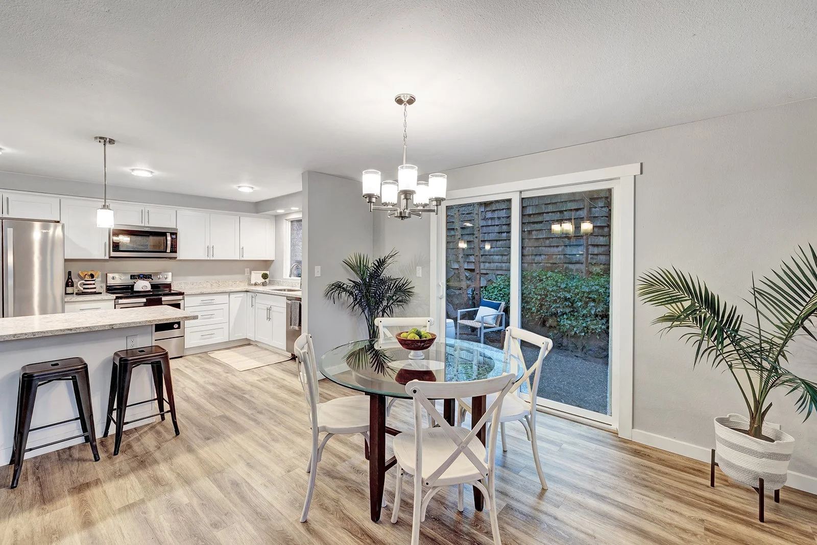 Spacious kitchen with full-size pantry and modern appliances in Kenmore home offering ample storage and functional design for everyday cooking