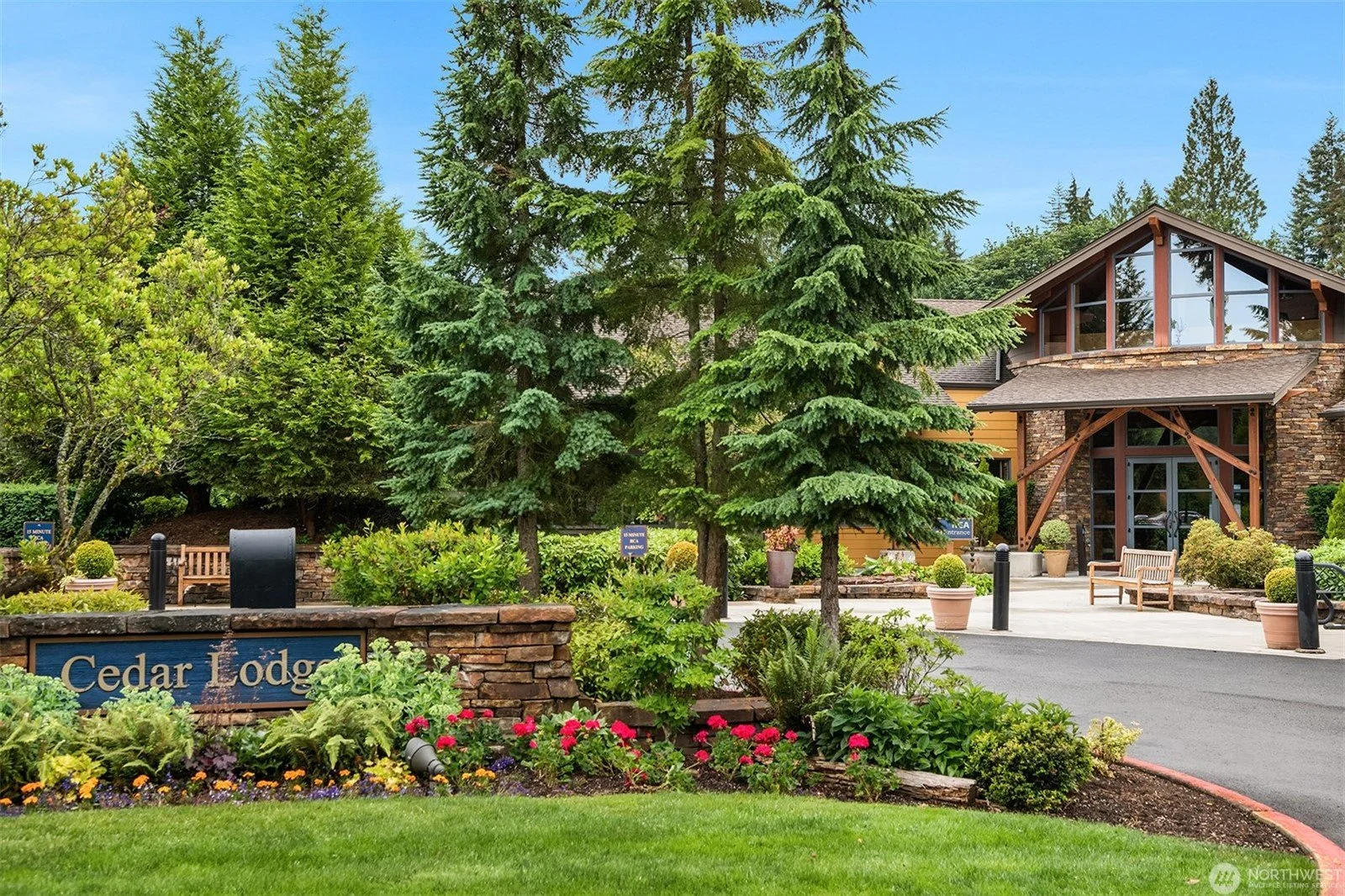 exterior of Cascade Club clubhouse with landscape..jpg