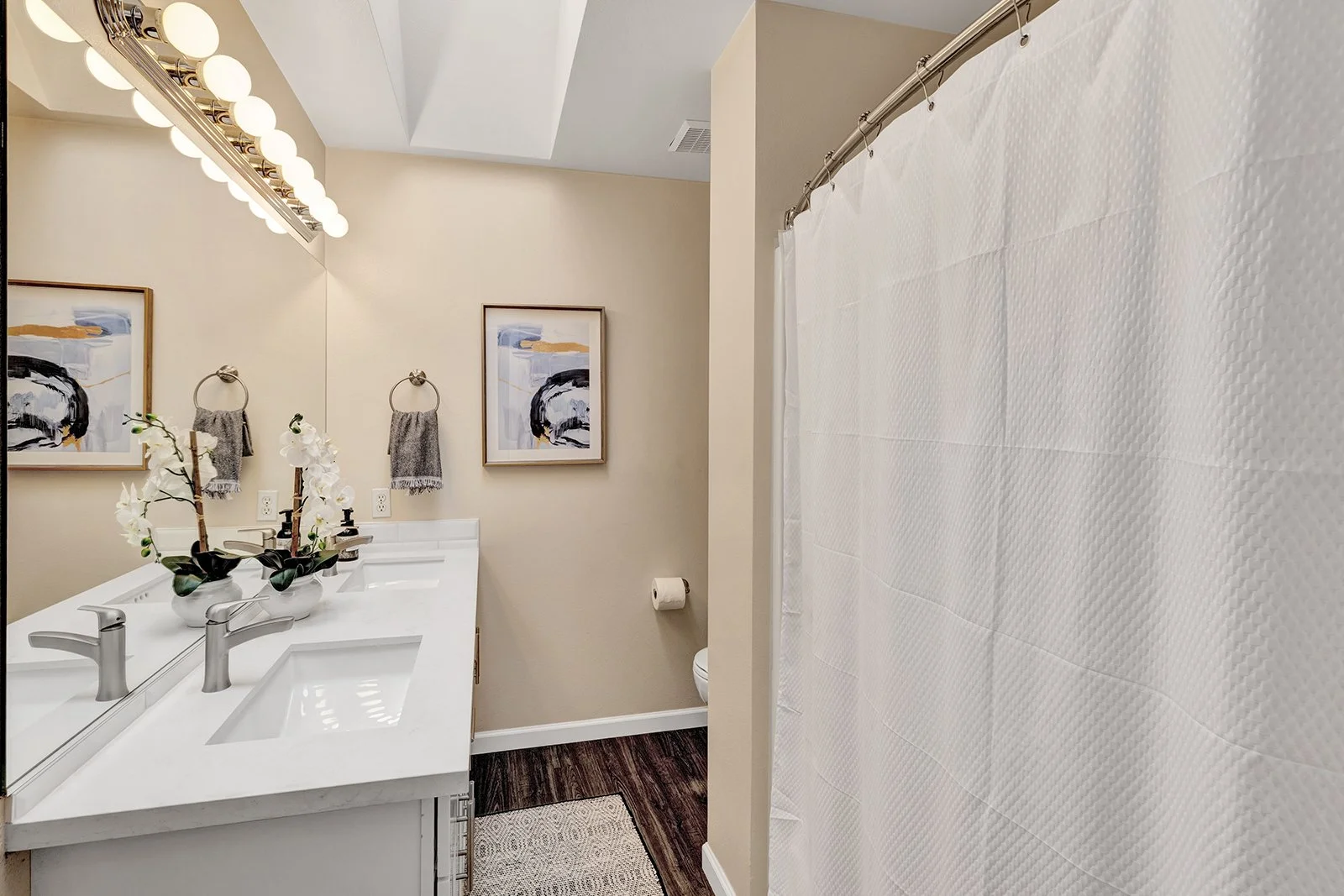Upper hallway bathroom — refreshed with modern finishes
