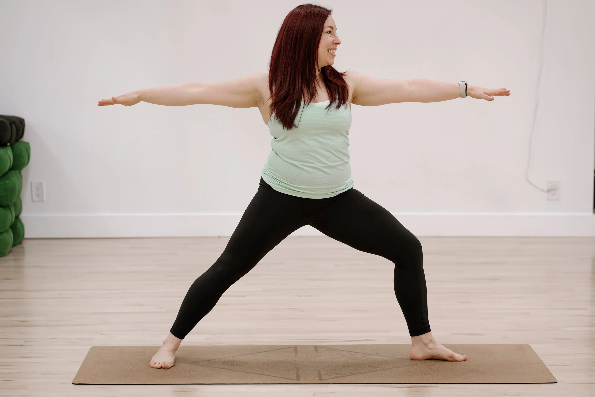 Woman in warrior 2 yoga pose