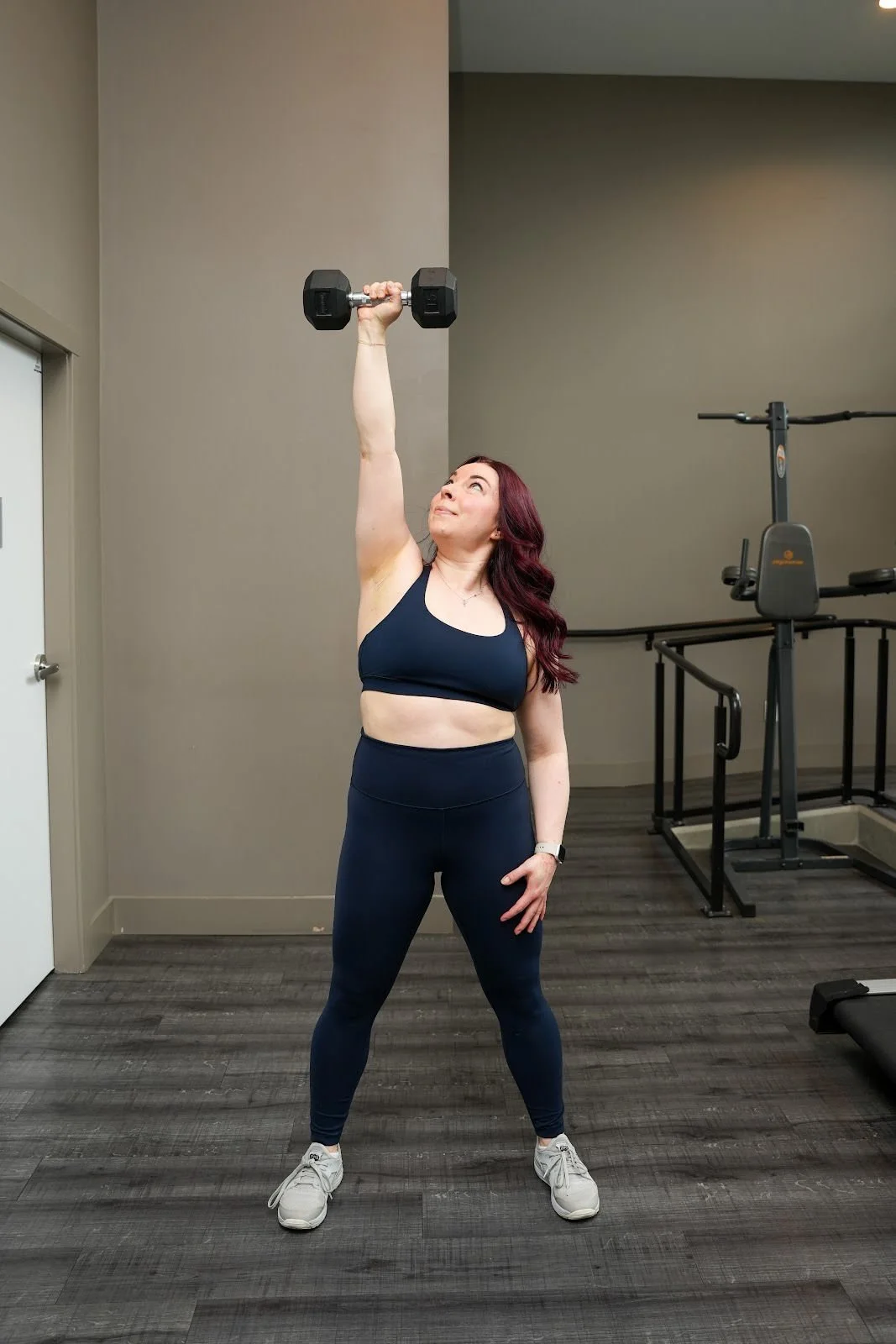 fit-woman-dumbbell-press.jpg (Copy) (Copy) (Copy)