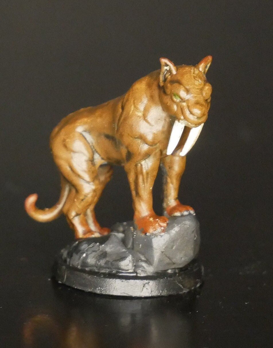 Custom painted Sabretooth Tiger/Similodon miniature | TTRPG | RPG | DND