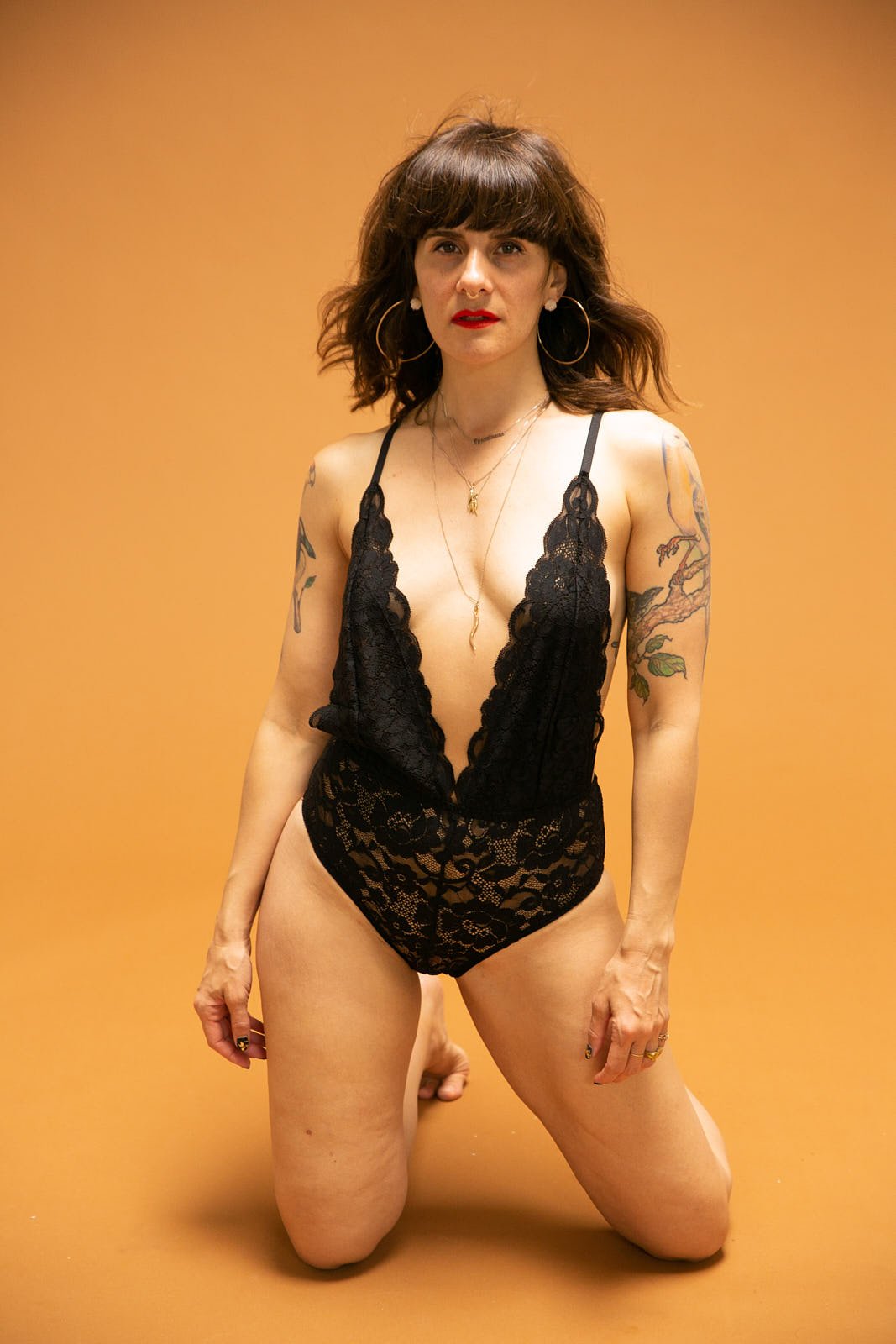 Bay Area boudoir photographer capturing a client's creative groove and confidence. Photo by Rikki Ward, Juicy Fruit Boudoir - Bay Area.