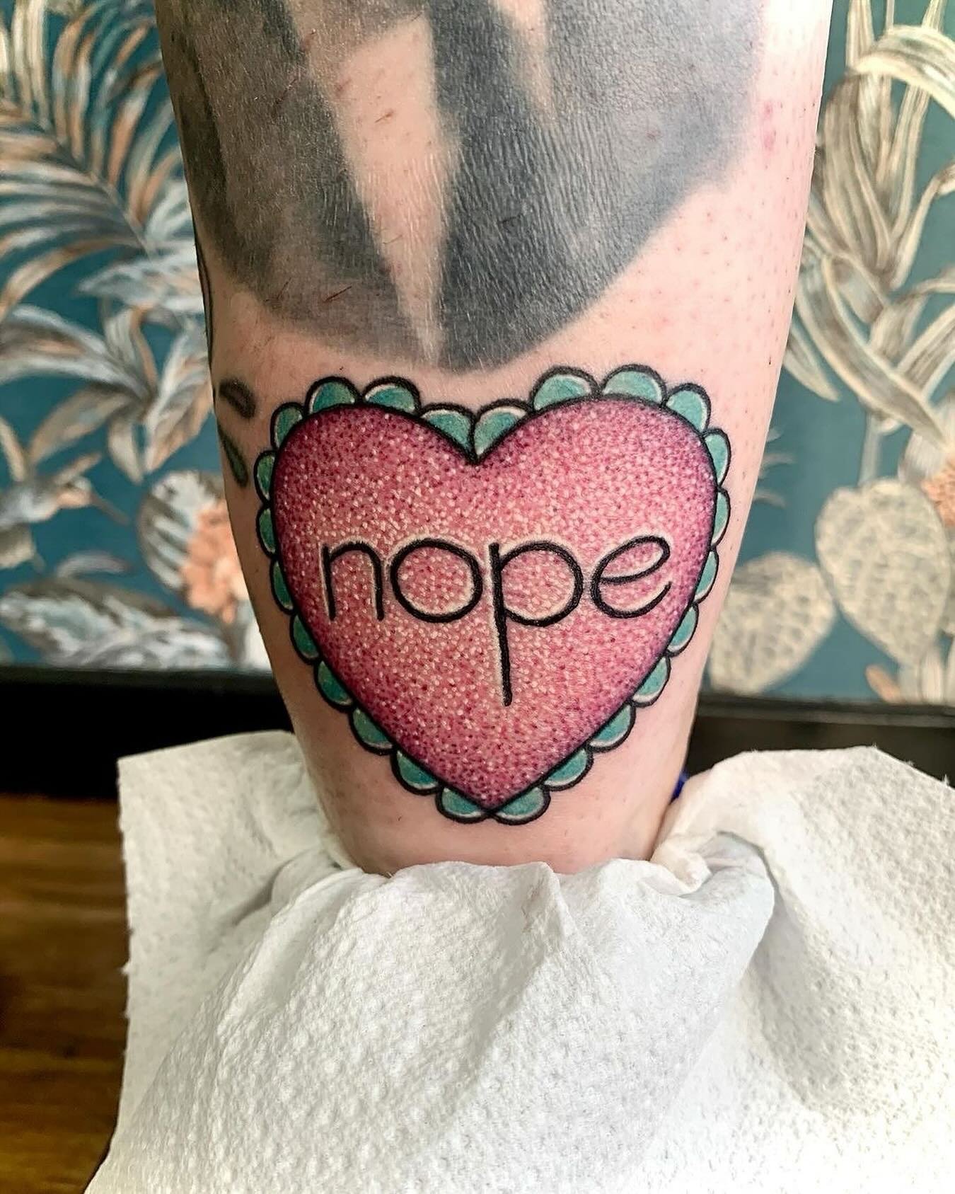 @charlieleightattoostuff Finally after 5 years we got this lil flash piece on the one and only @patchworkpoet_  thank you for sitting like a legend ⚓️ #glittertattoo #colourtattoo #glitter #prettytattoo #sassytattoo #cutetattoo #nope #sassy