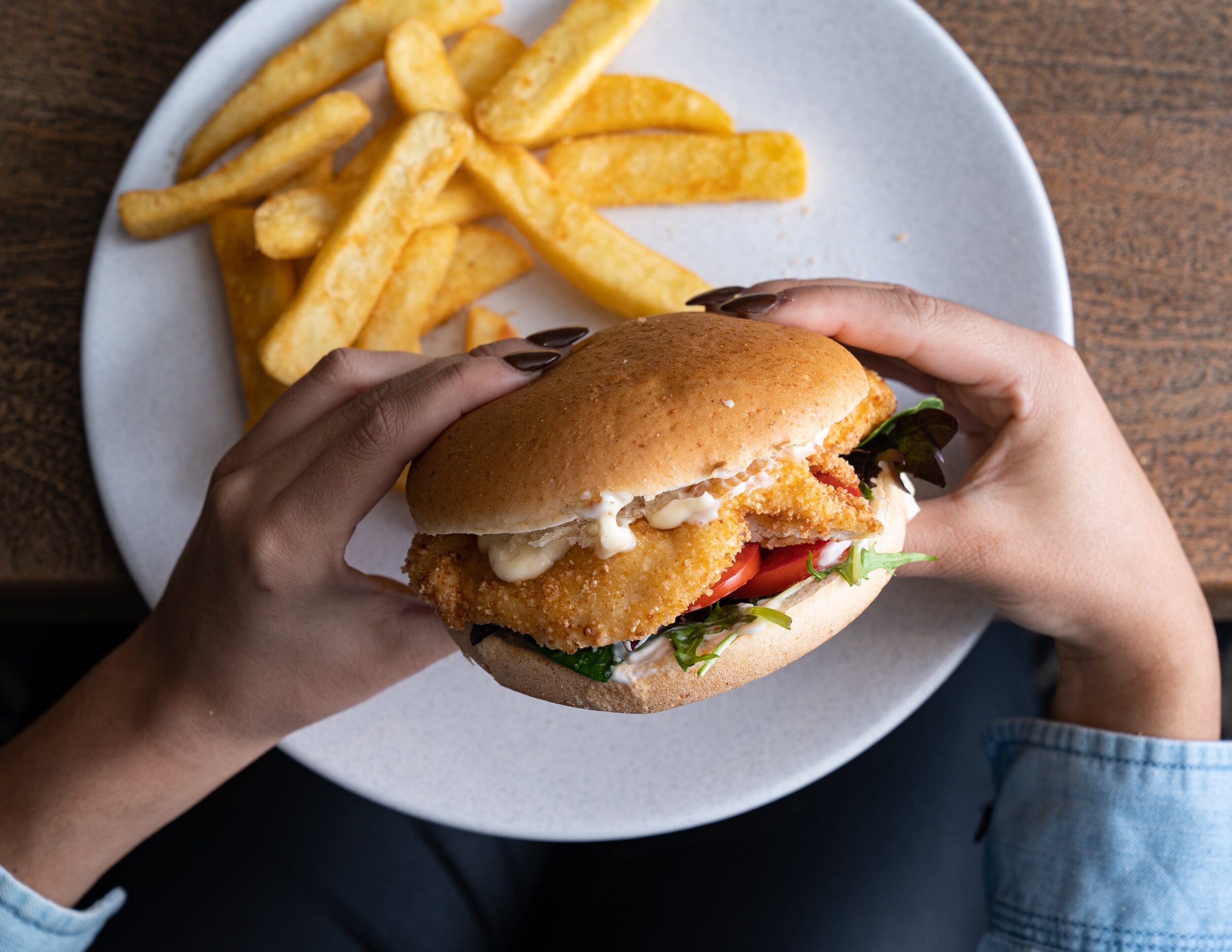 Chicken burger served with fries